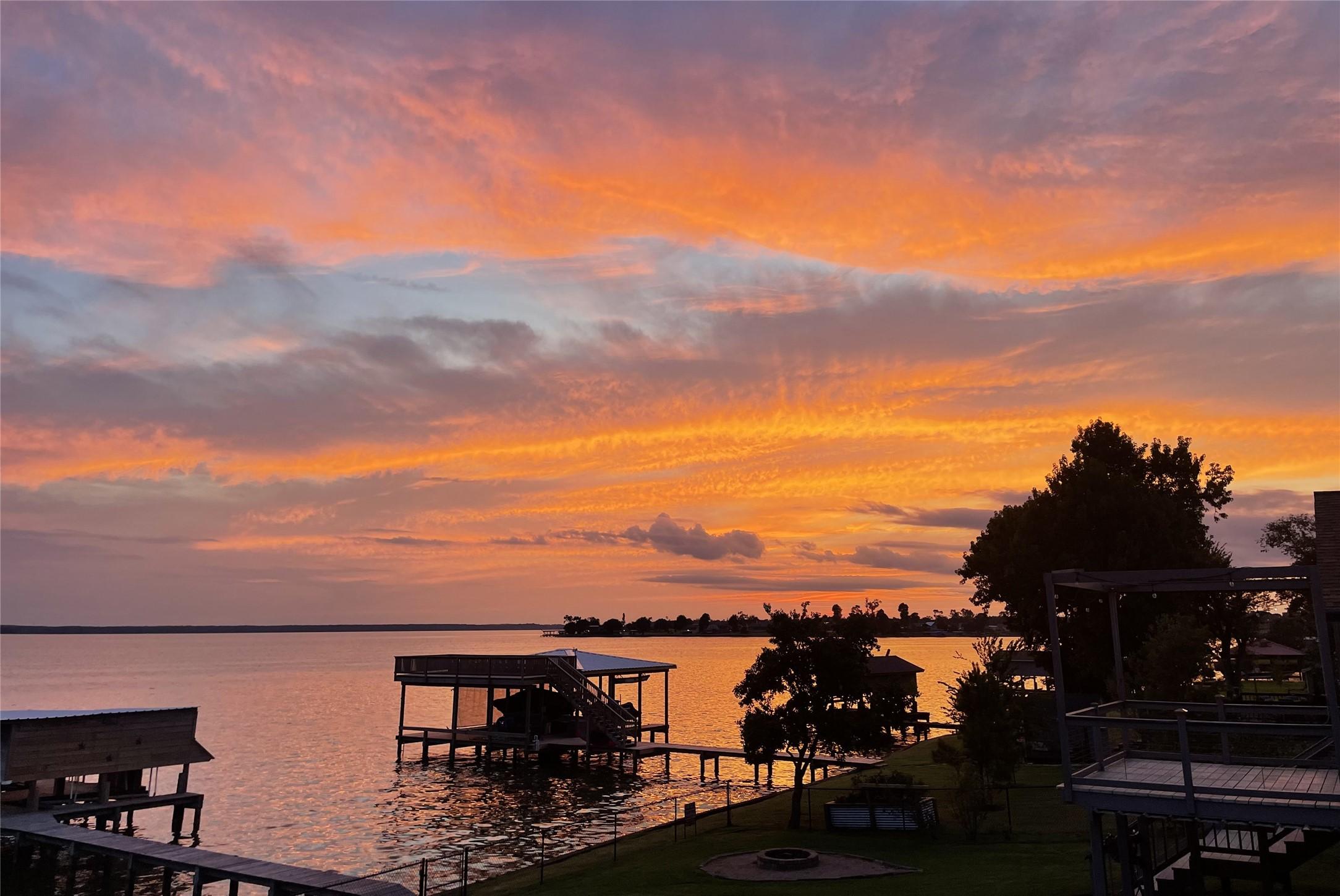 Image 2: Unwind each evening with stunning lake sunsets as