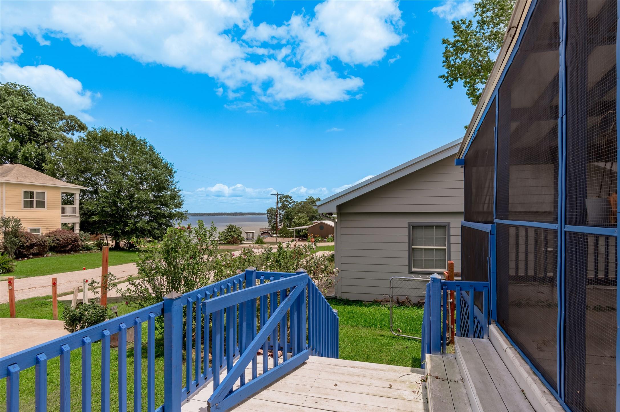 Image 4: Imagine sitting on the screened porch and enjoying