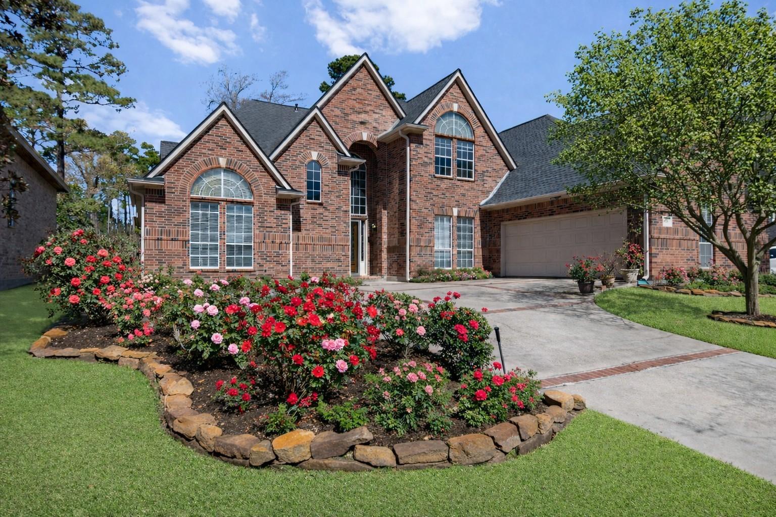 Image 1: Welcome to 299 Wedgewood.  The beautifu roses are