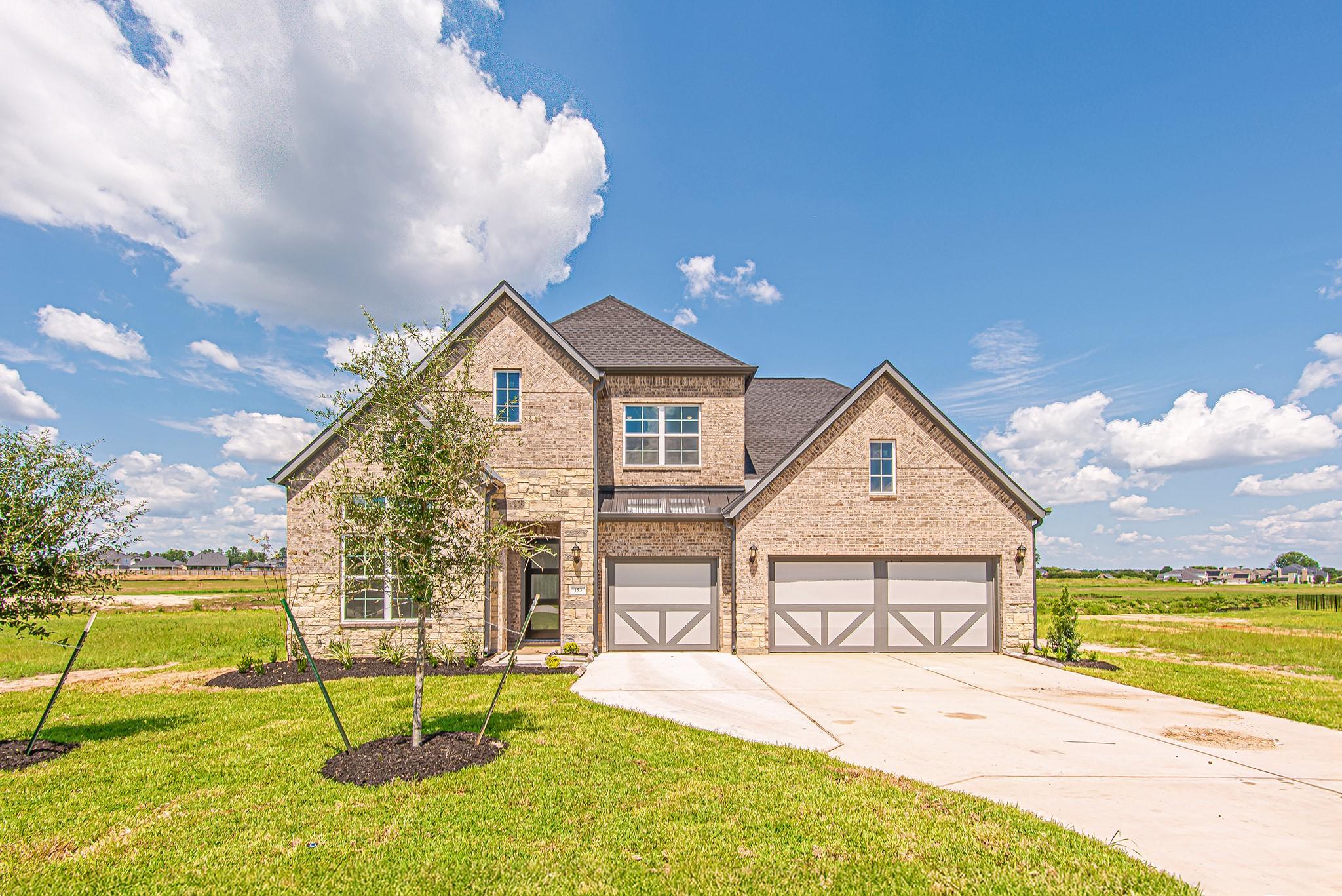 Image 1: Striking curb appeal welcomes you with a beautiful