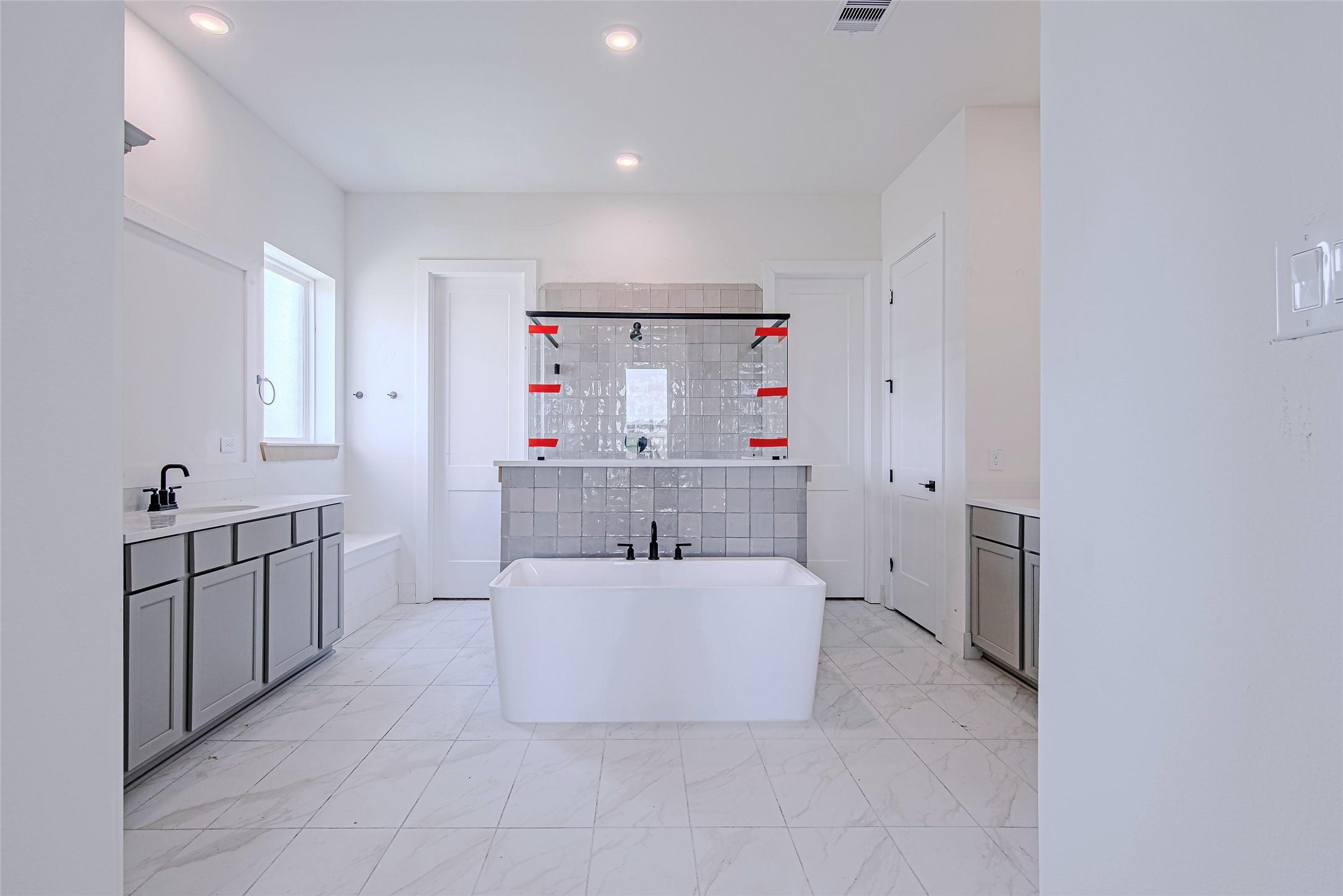 Image 4: The open-concept floor plan flows seamlessly from