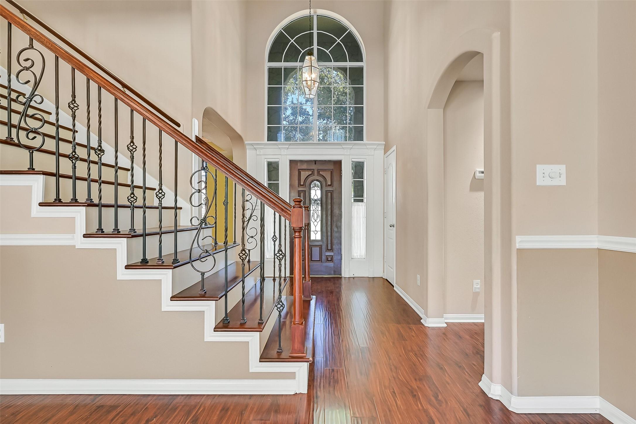 Image 3: This photo showcases a bright, inviting entryway w