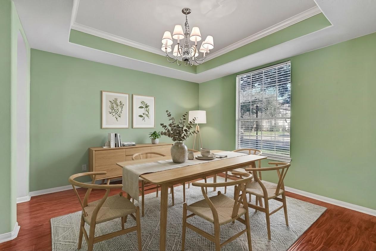 Image 4: This virtually staged dining room combines fresh m