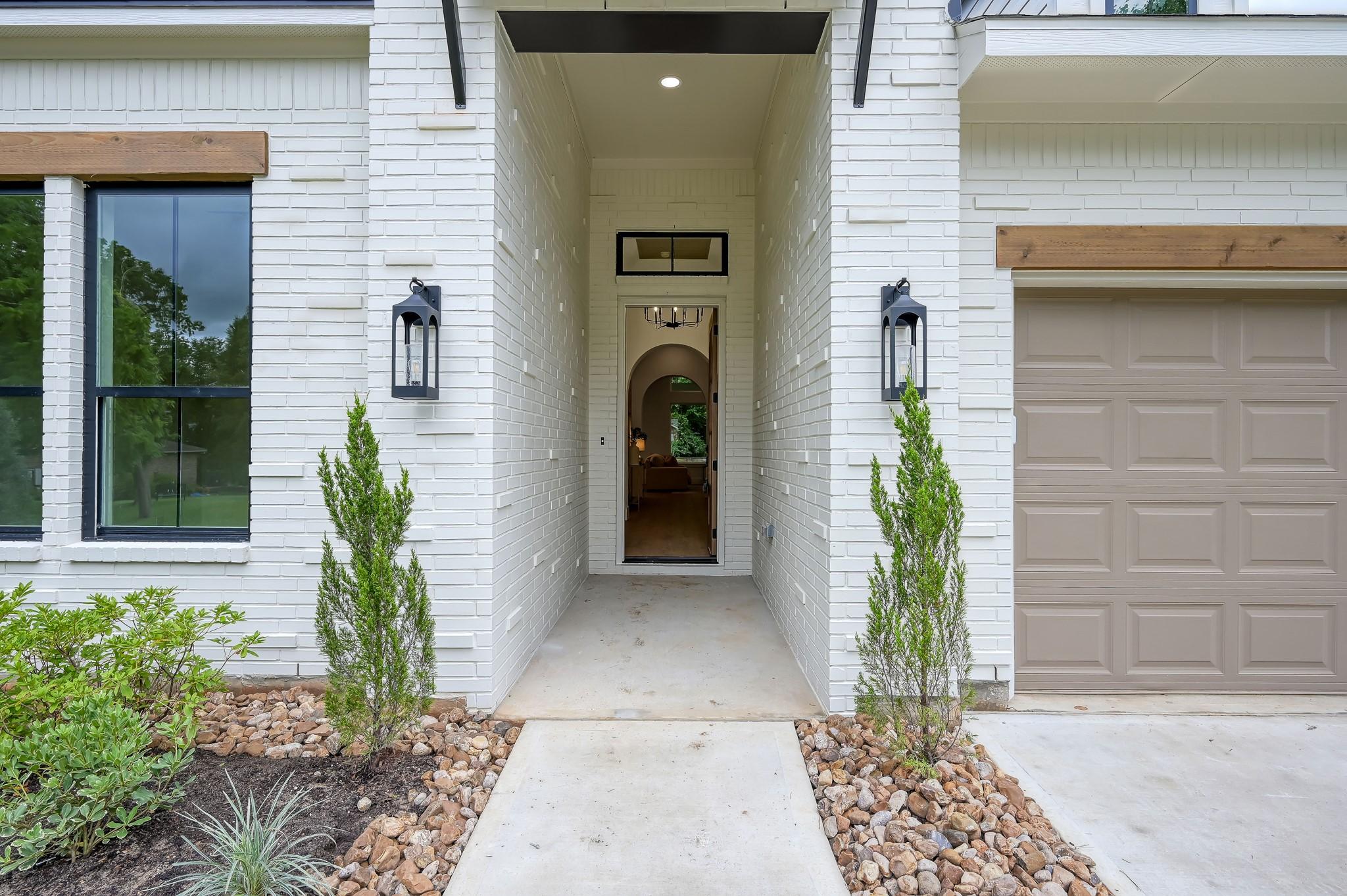 Image 4: Notice the exquisite brick detail & cedar accents