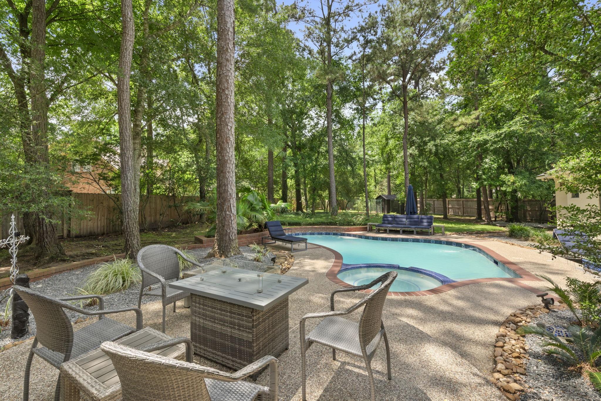 Image 2: Private fully fenced and wooded lot sited on just