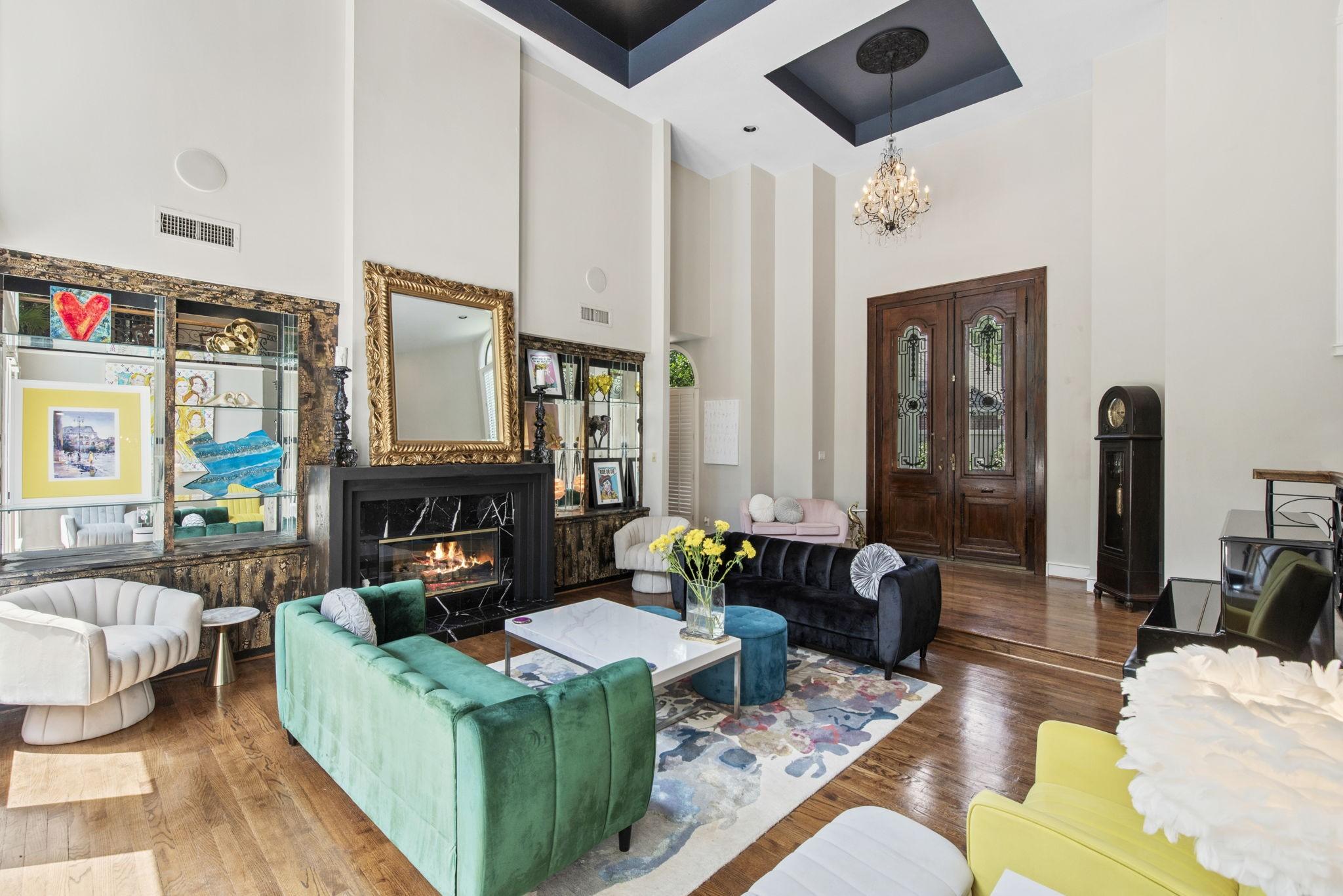 Image 4: Formal living arear with soaring ceilings and tons