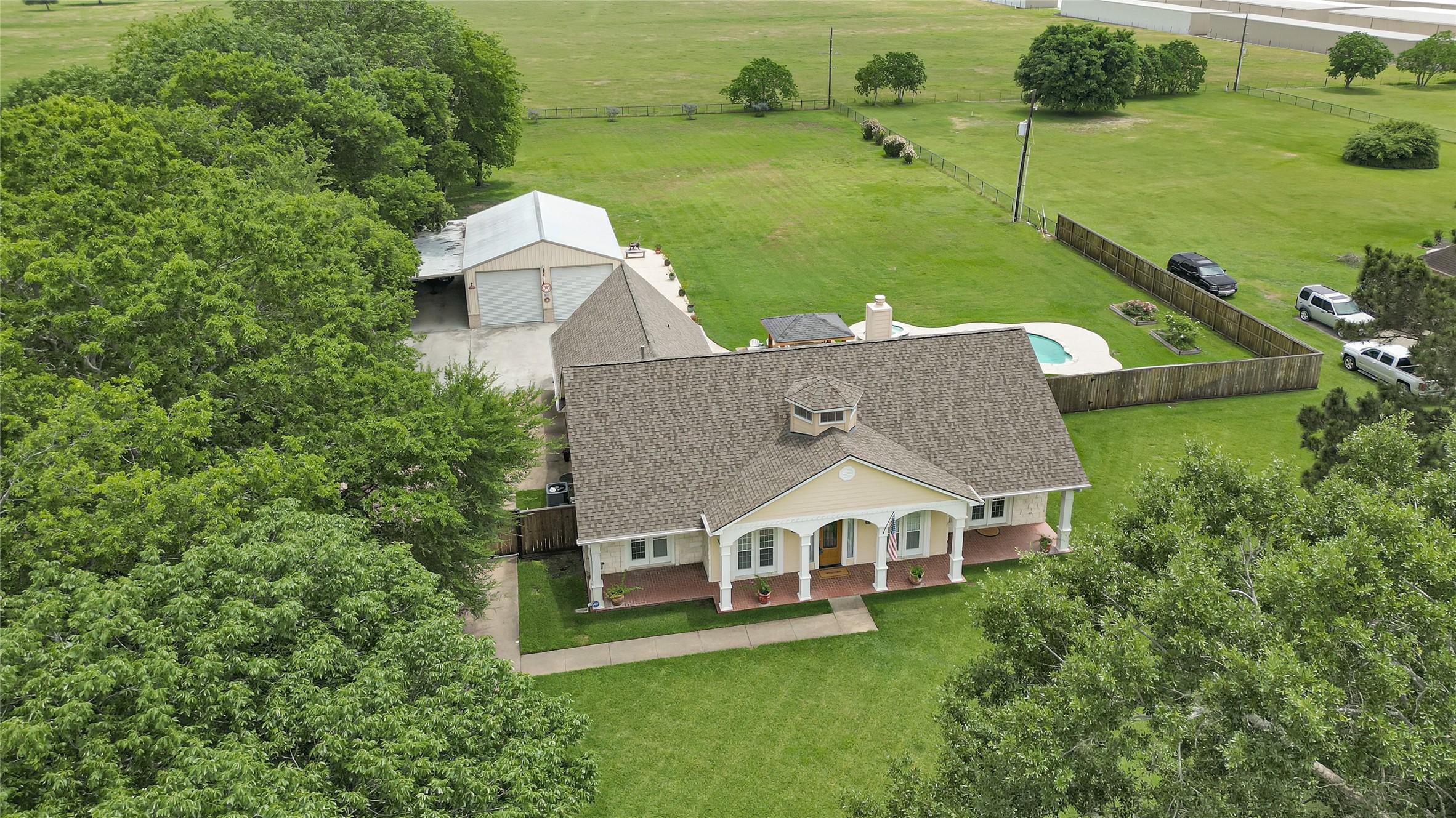 Image 2: Located on 1.87 Acres of beautifully landscaped pr