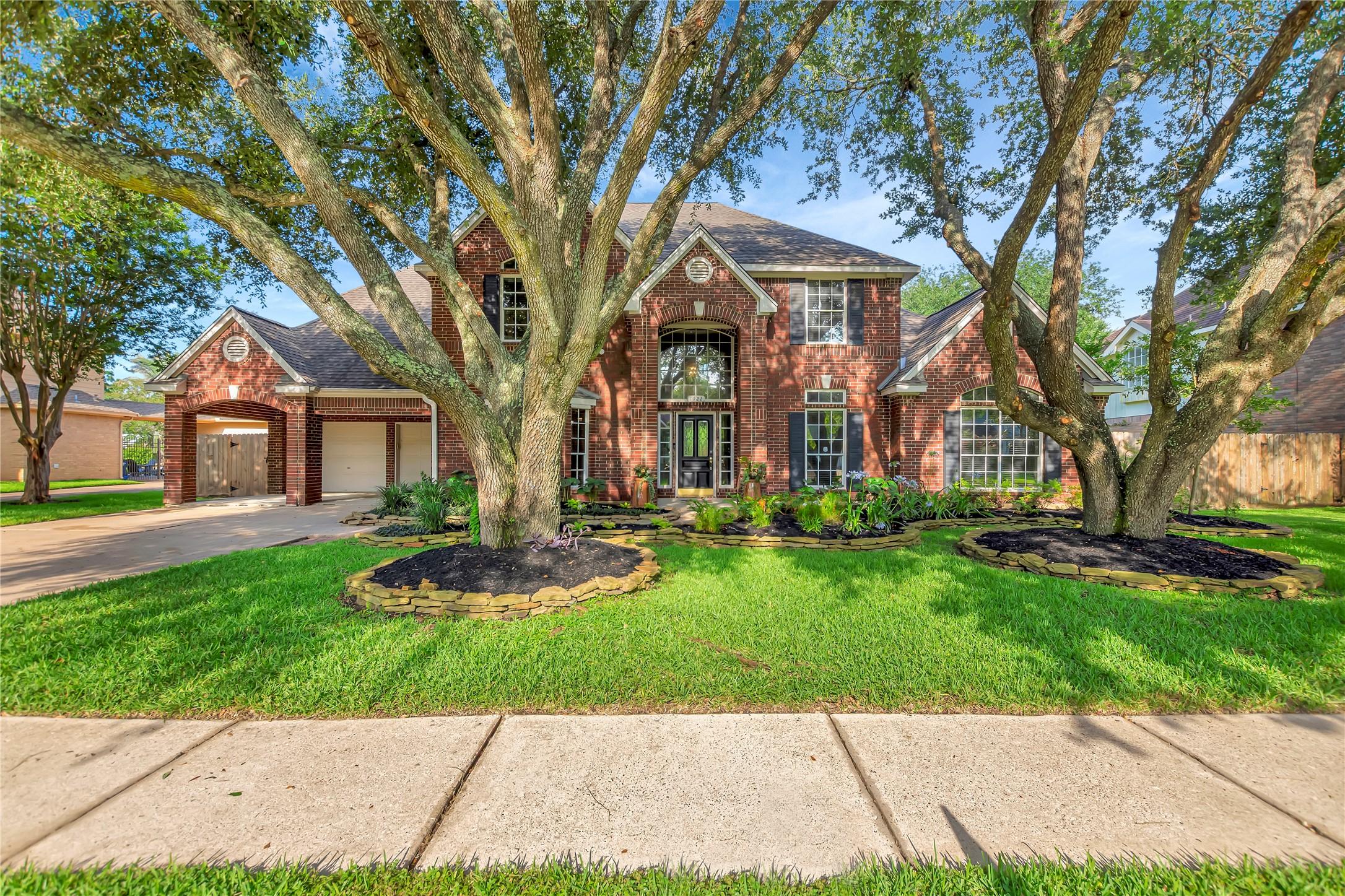 Image 1: Street view of the property with A+ curb appeal!