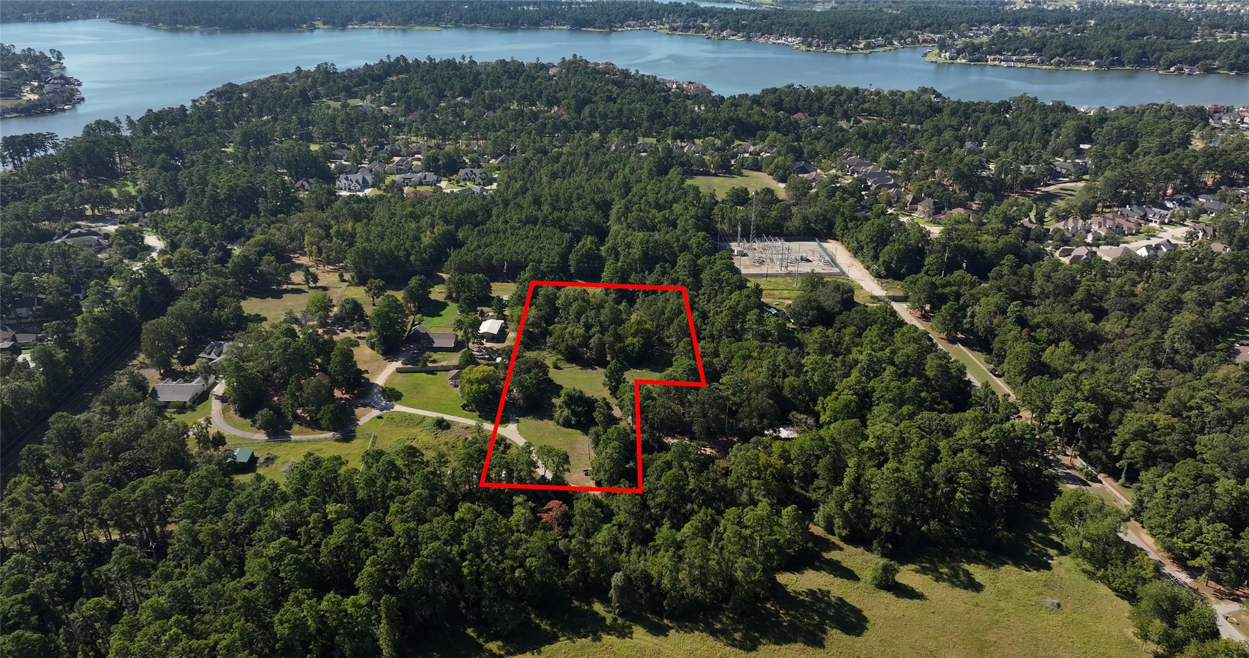 Image 1: Lake Conroe in the background