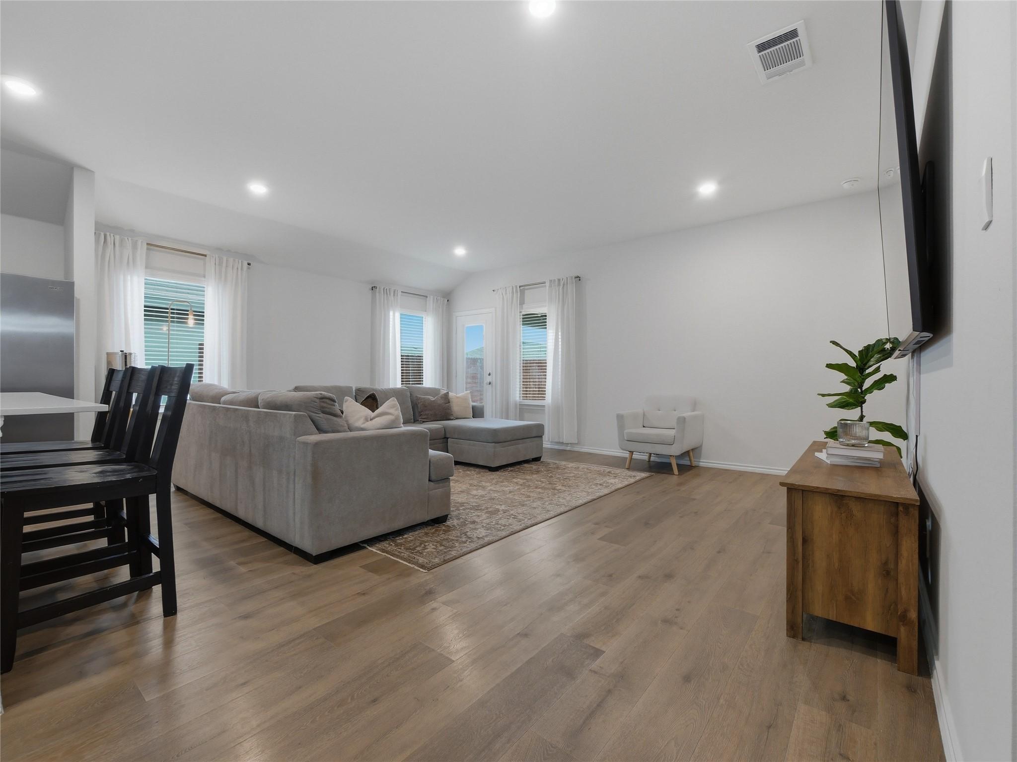 Image 3: Beautiful and spacious den has great lighting, lam