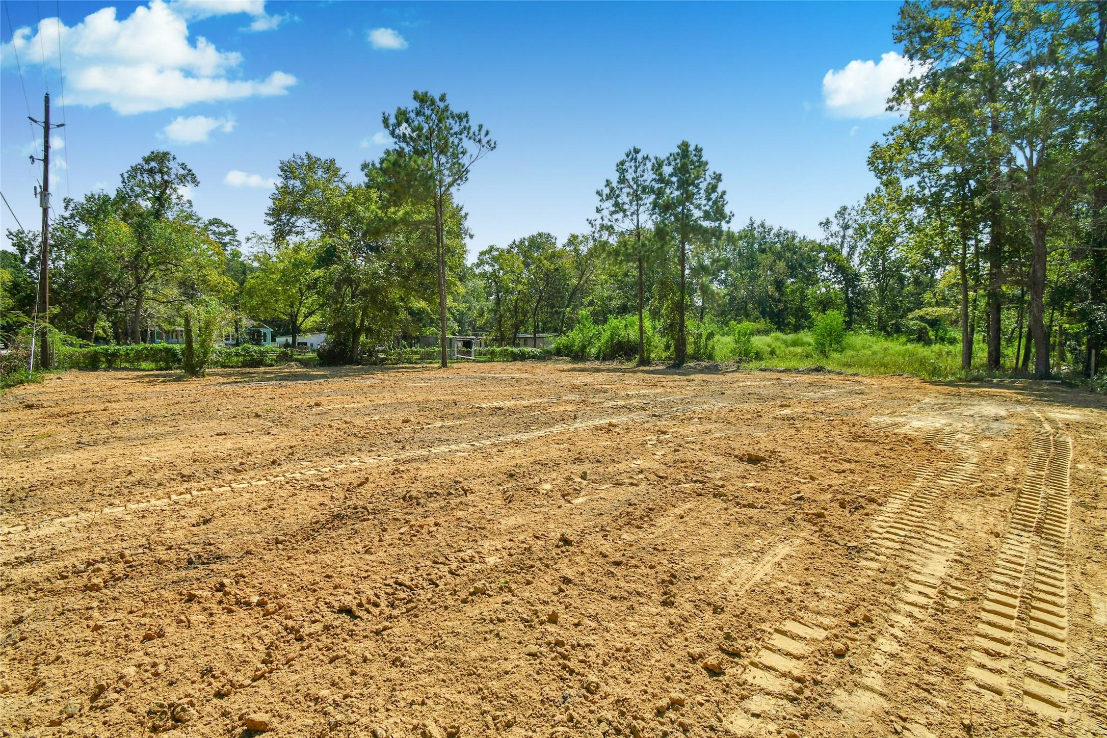 Image 2: Expansive, cleared land offers a perfect canvas fo