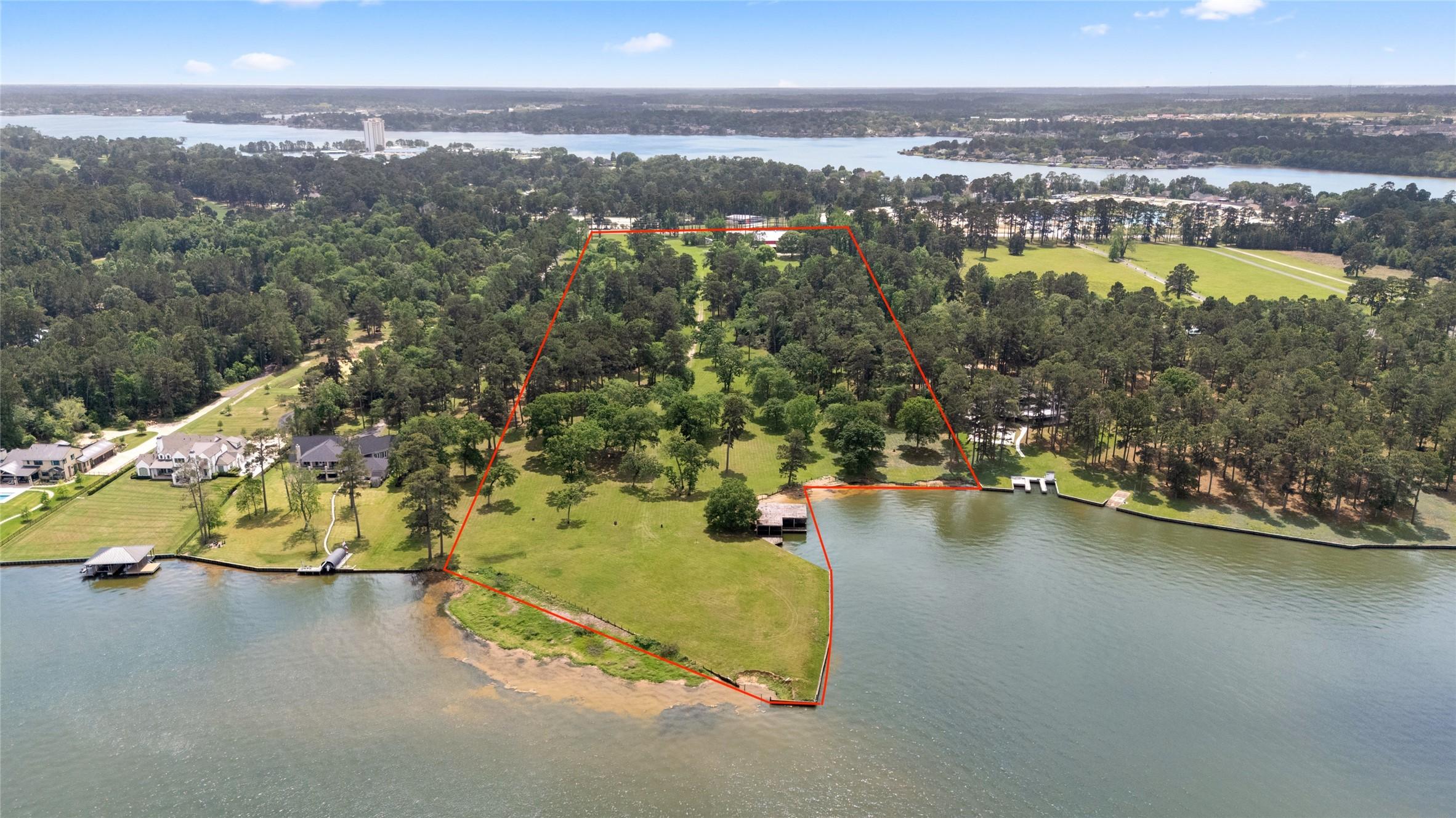 Image 4: A view of the waterfront frontage with an island j