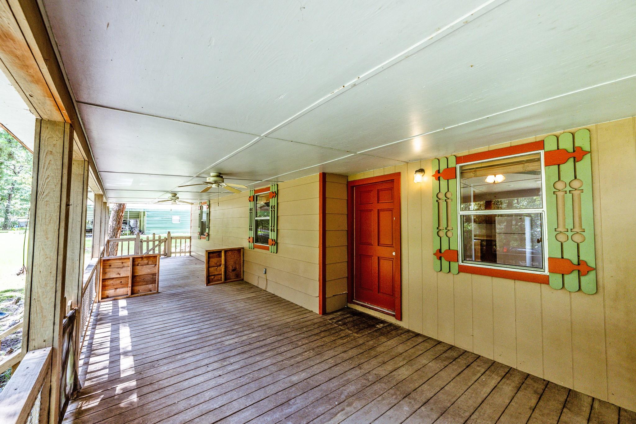 Image 3: A large, welcoming front porch greets you