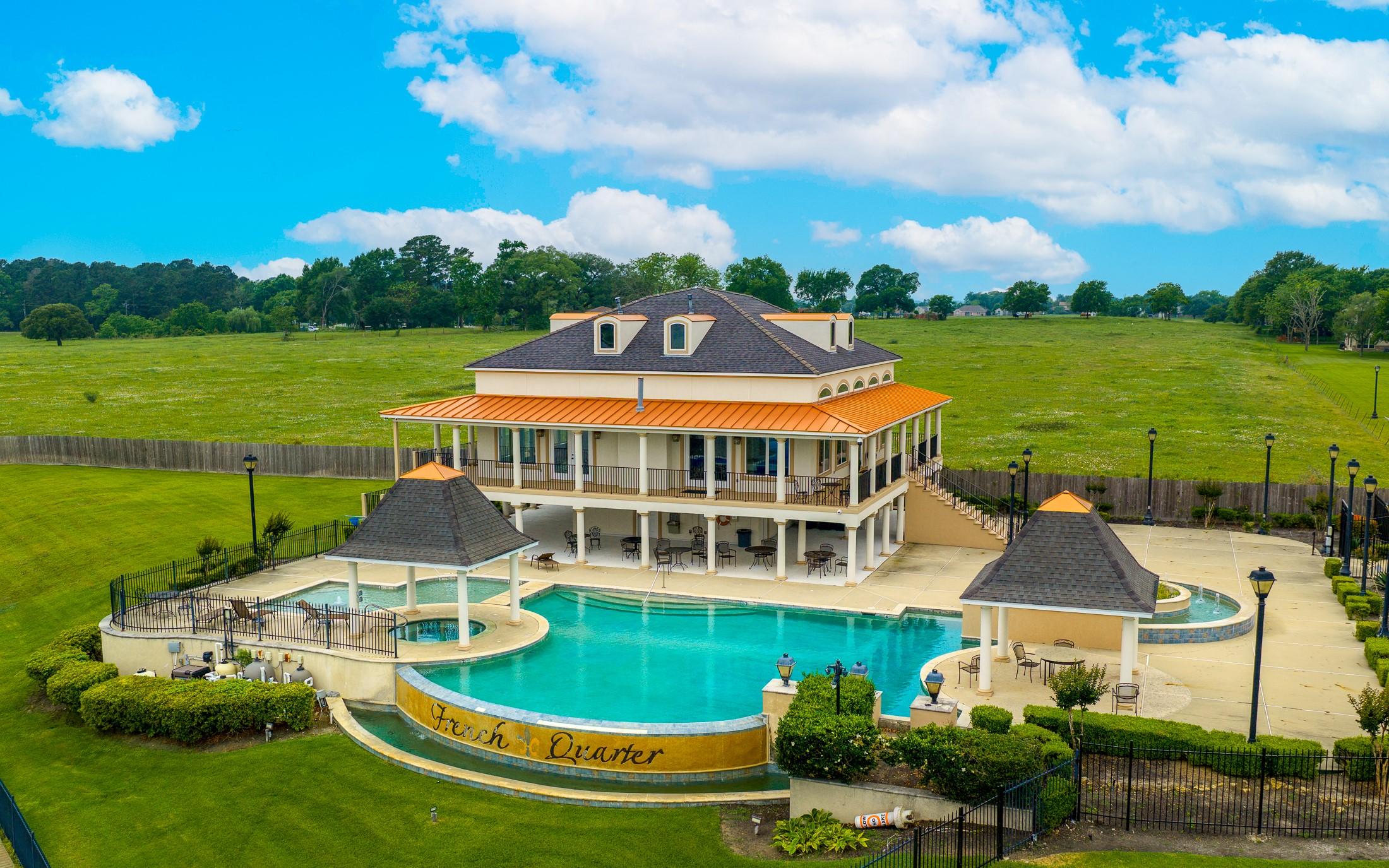 Image 4: French Quarter features a clubhouse, swimming pool