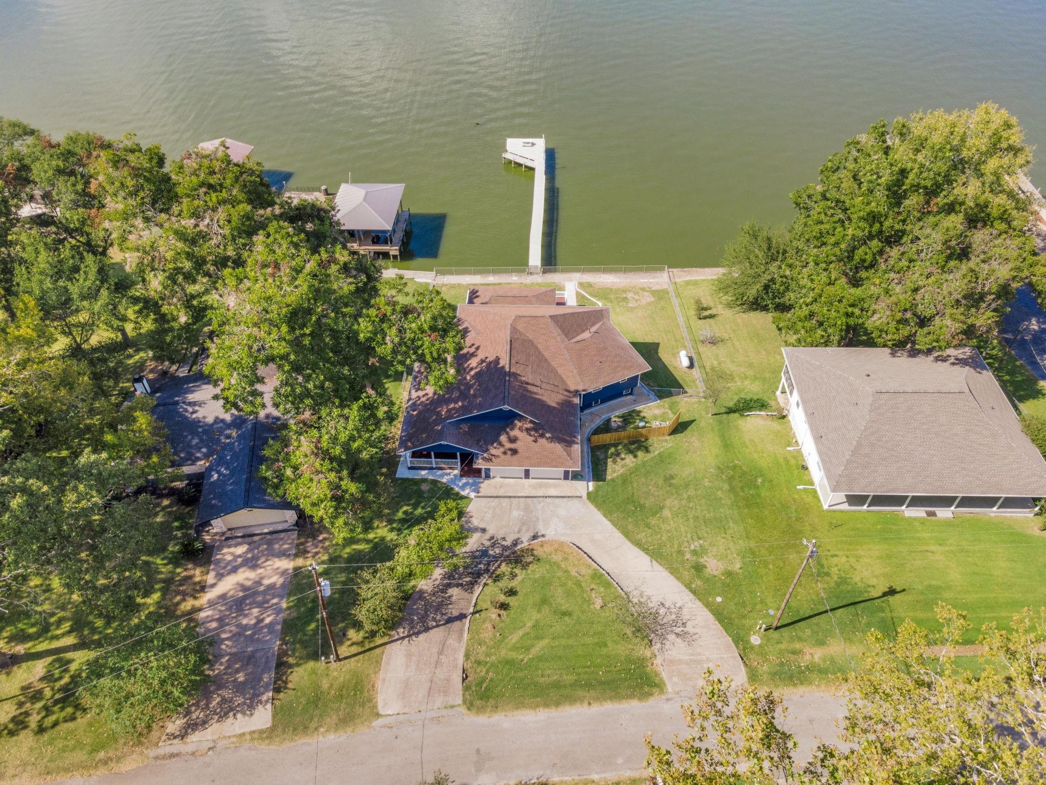 Image 3: This waterfront home is located on the south side