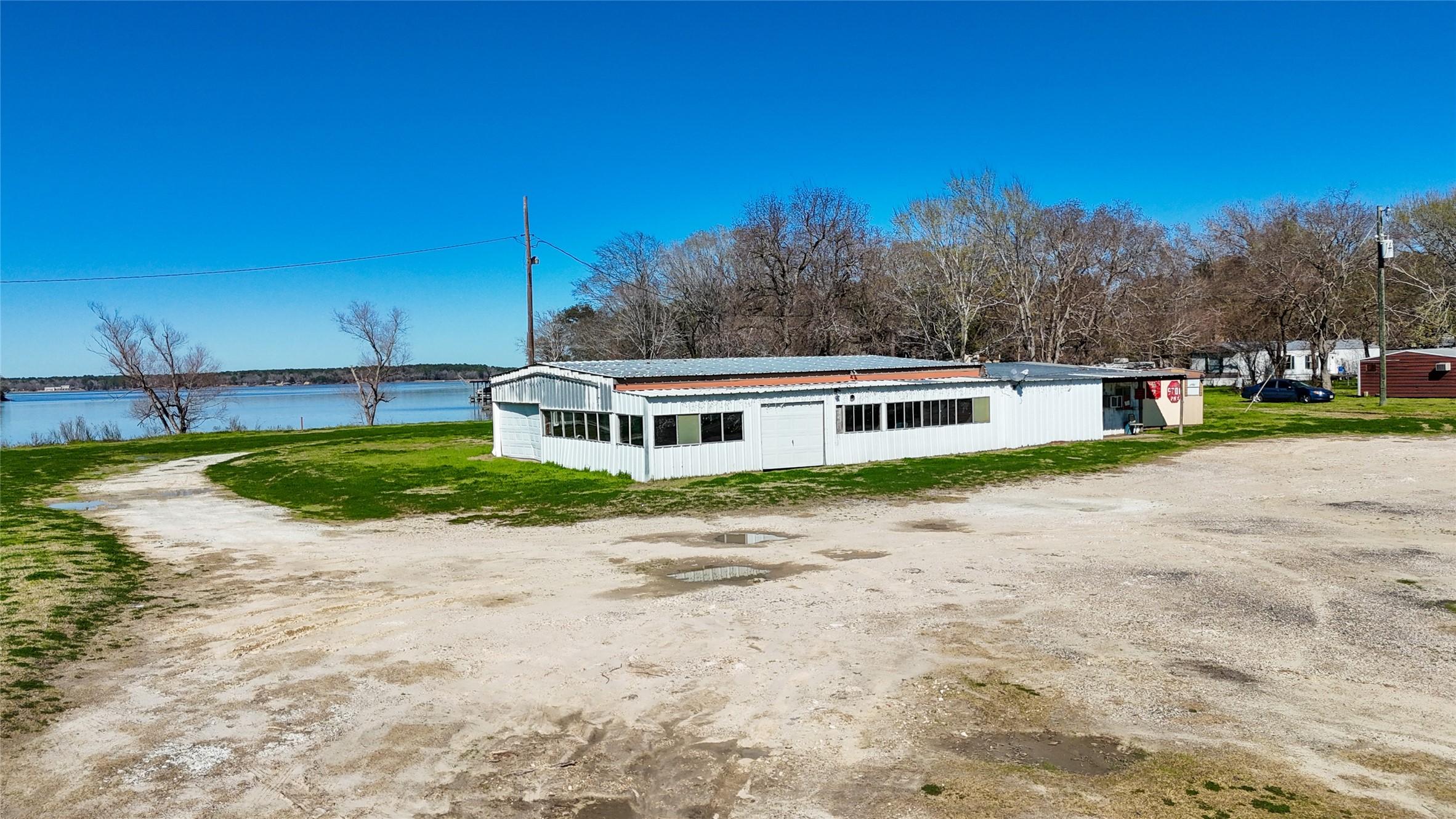 Image 4: Bar/ice house on property