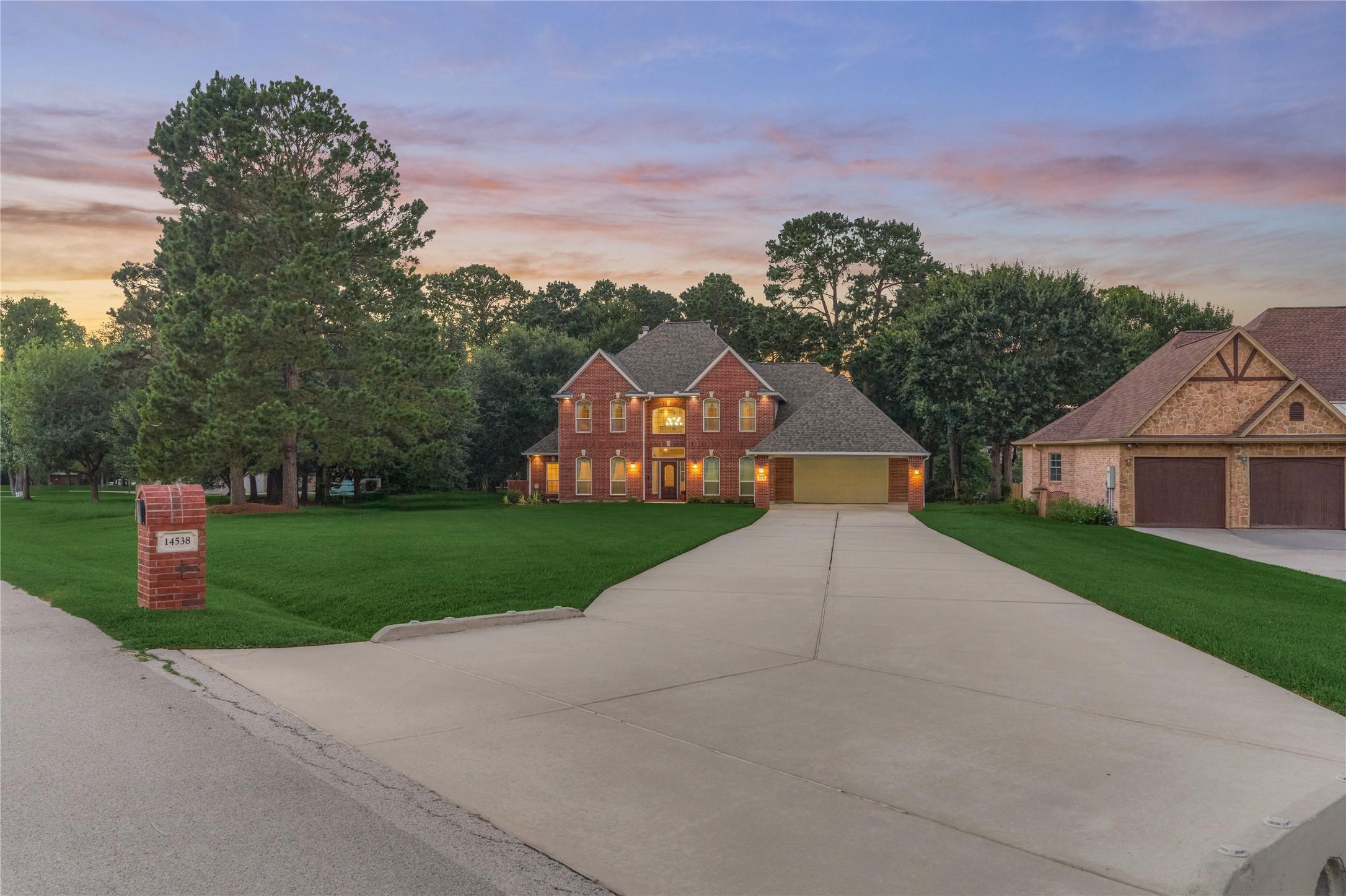 Image 2: This stunning custom waterfront home is perfectly