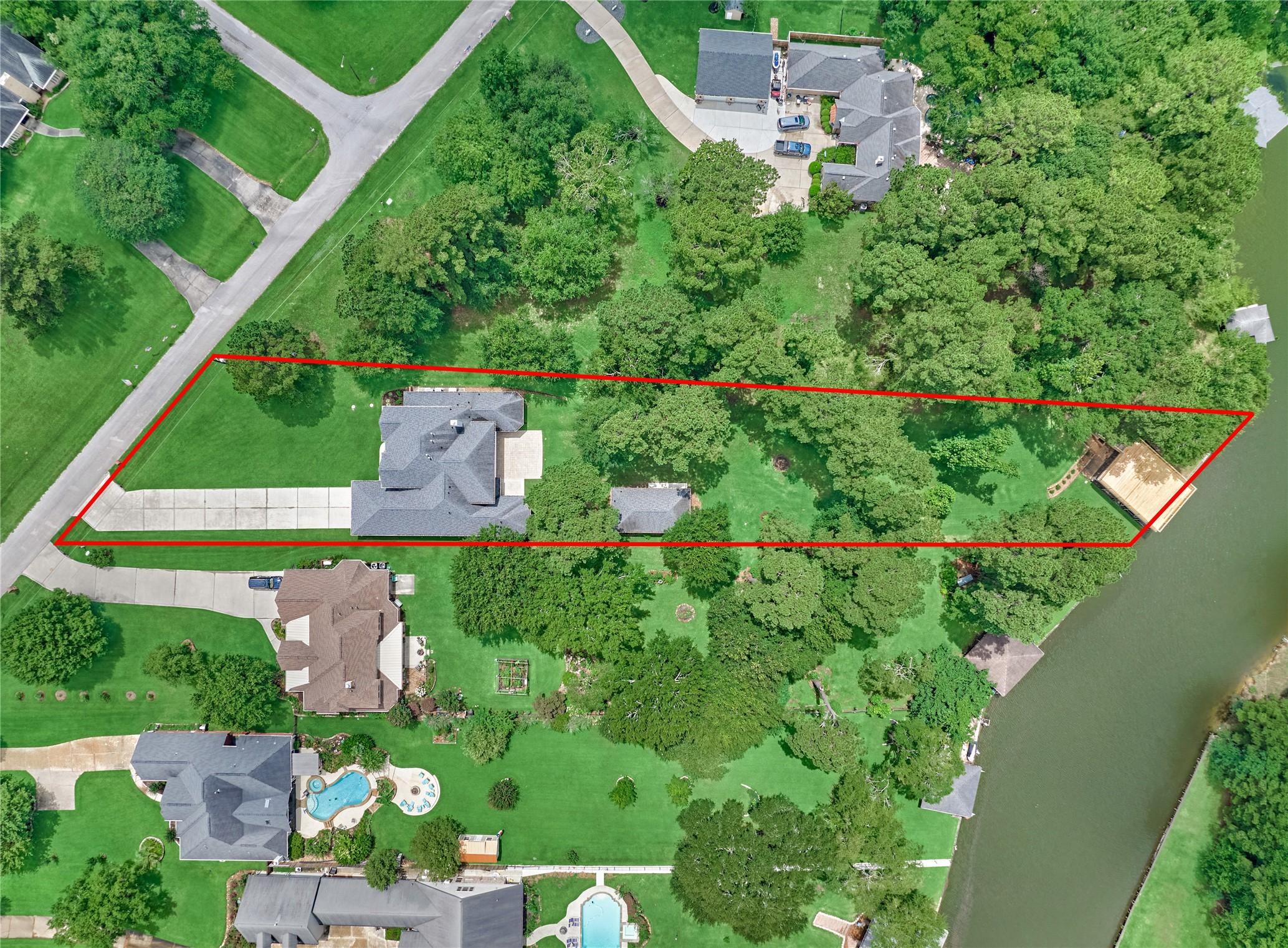 Image 4: This amazing one-acre property features a 5,017 sq