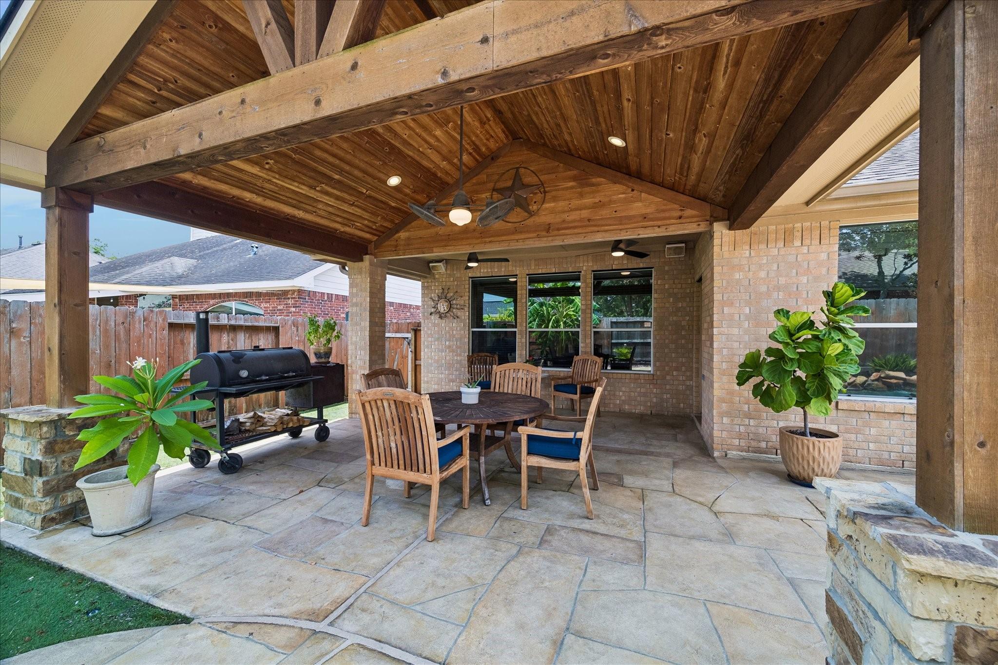 Image 3: This large extended patio is perfect for grillin'