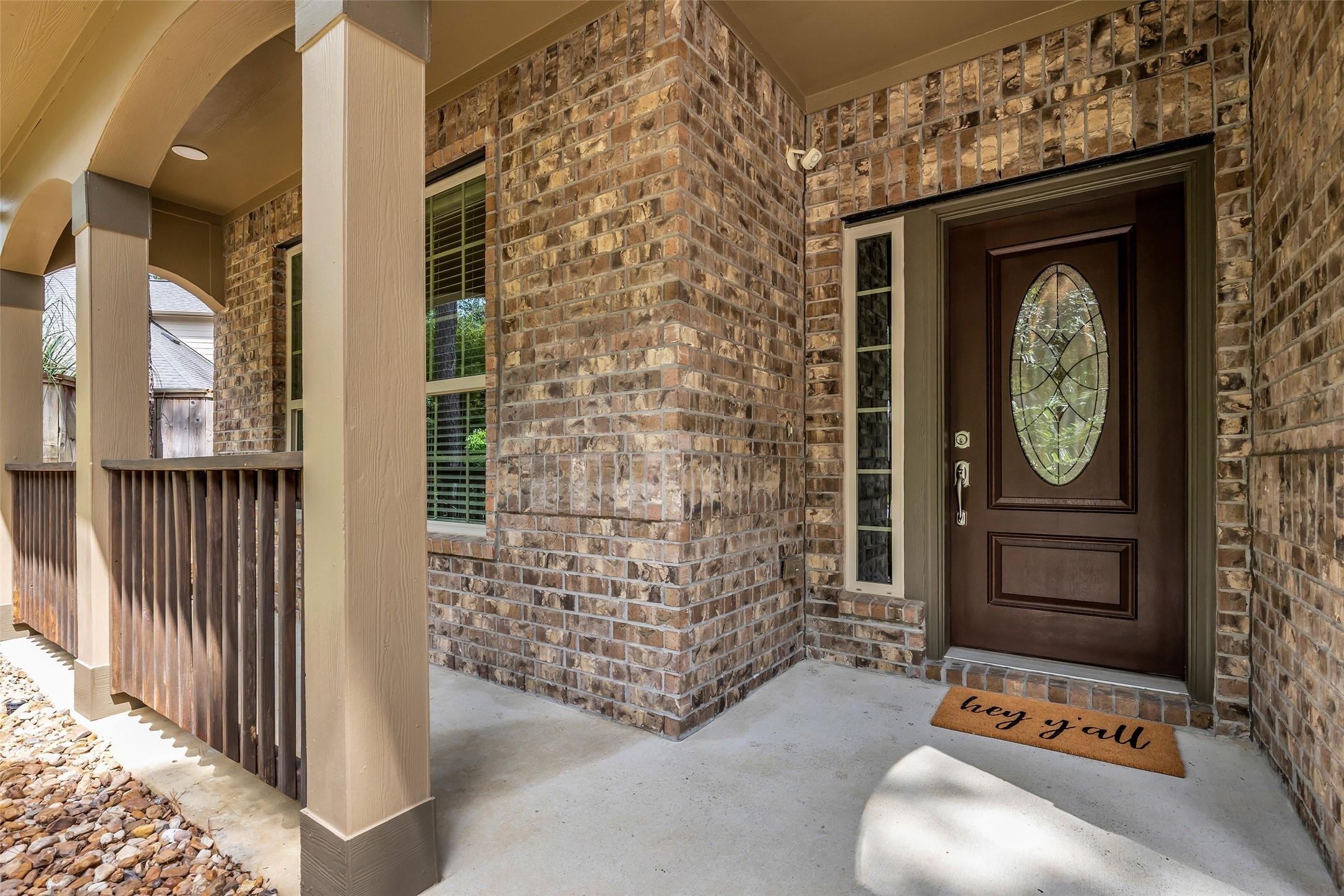 Image 2: Cozy covered front porch.