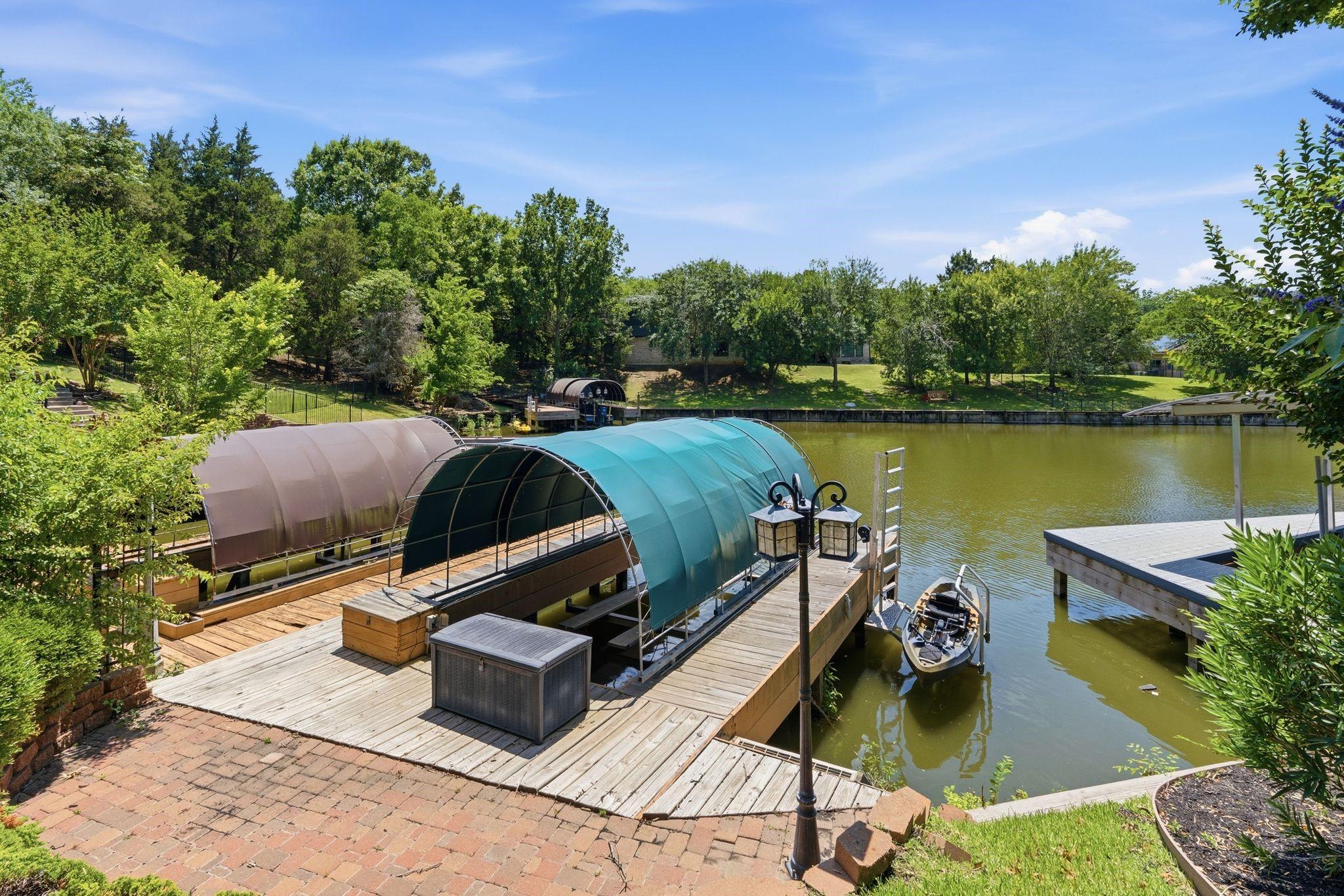 Image 2: Covered boat doc & kayak lift.