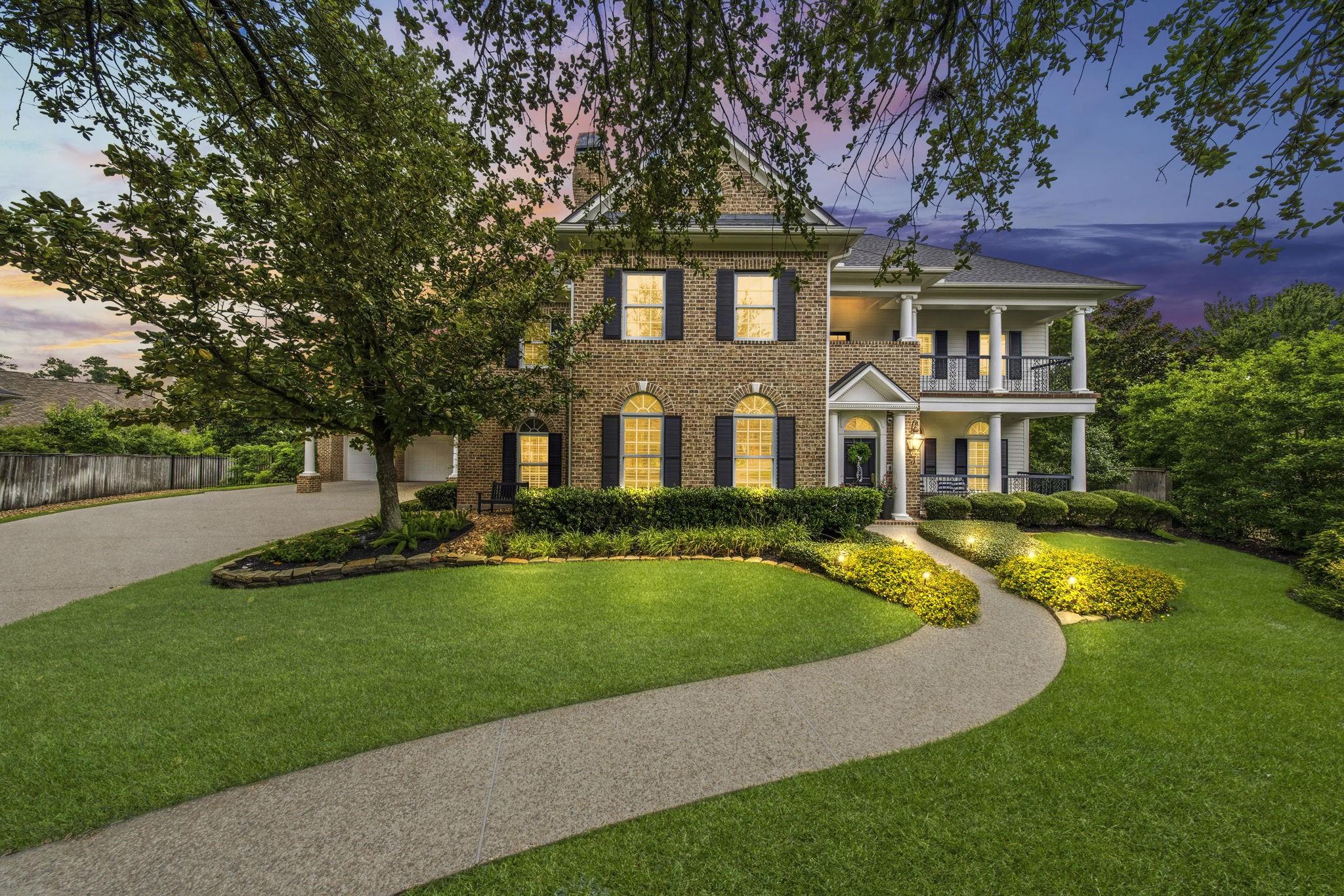 Image 1: Stately New Orleans-style brick residence with tim