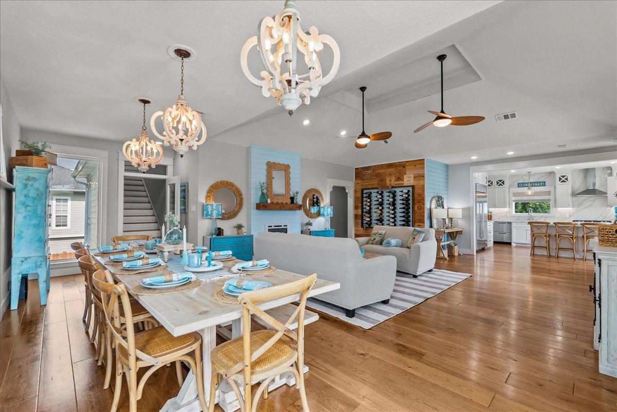 Image 4: Large open area dining, living and kitchen.
