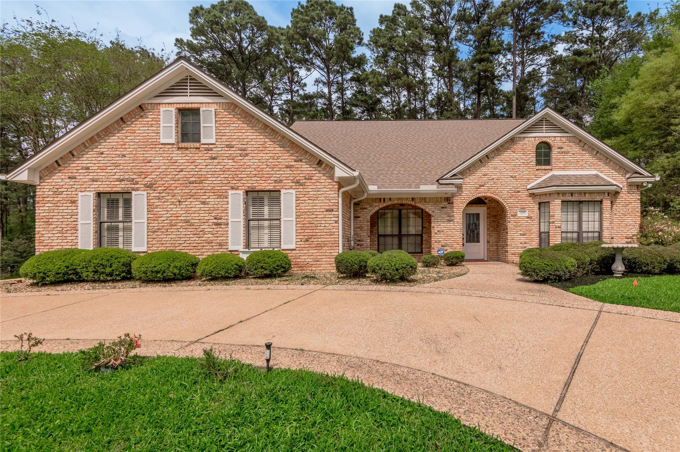 Image 1: Beautifully crafted custom home with charming bric