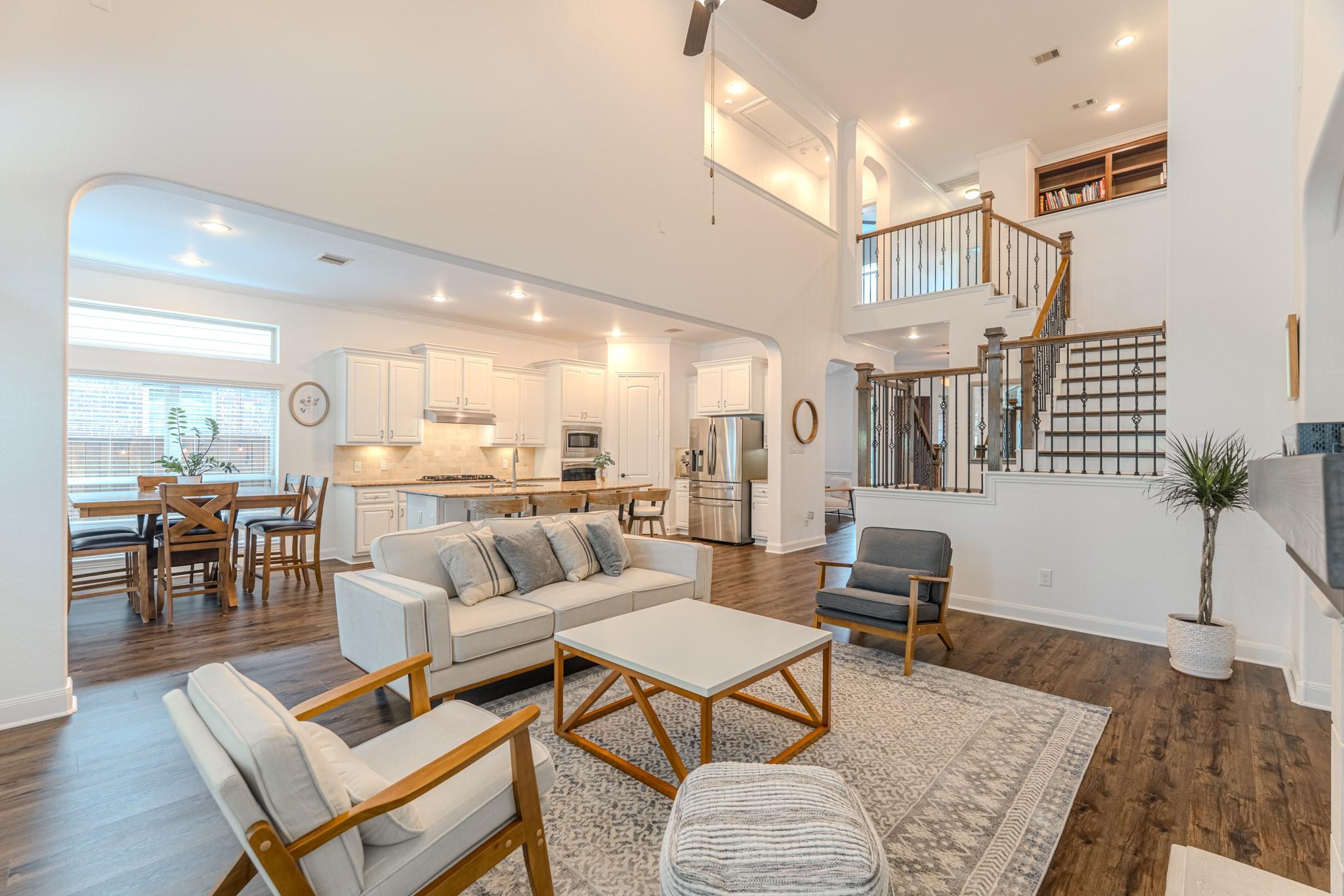Image 1: This photo showcases a charming home with a spacio