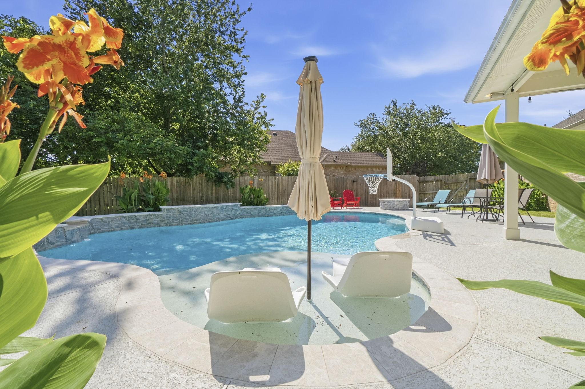 Image 2: Relax in the sun shelf area overlooking the beauti