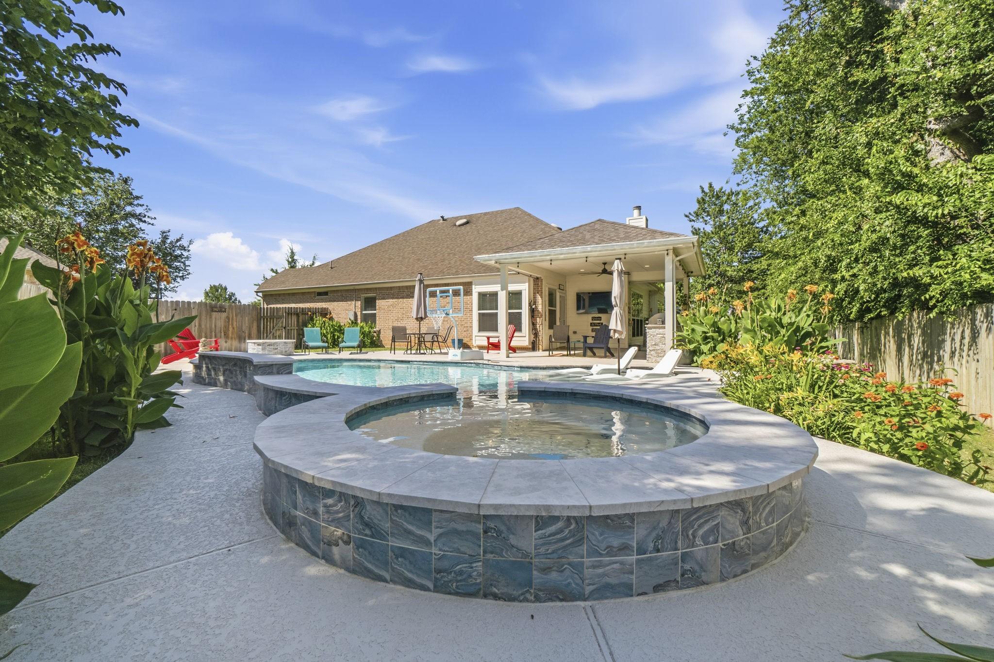 Image 3: Resort-style backyard oasis designed for relaxing