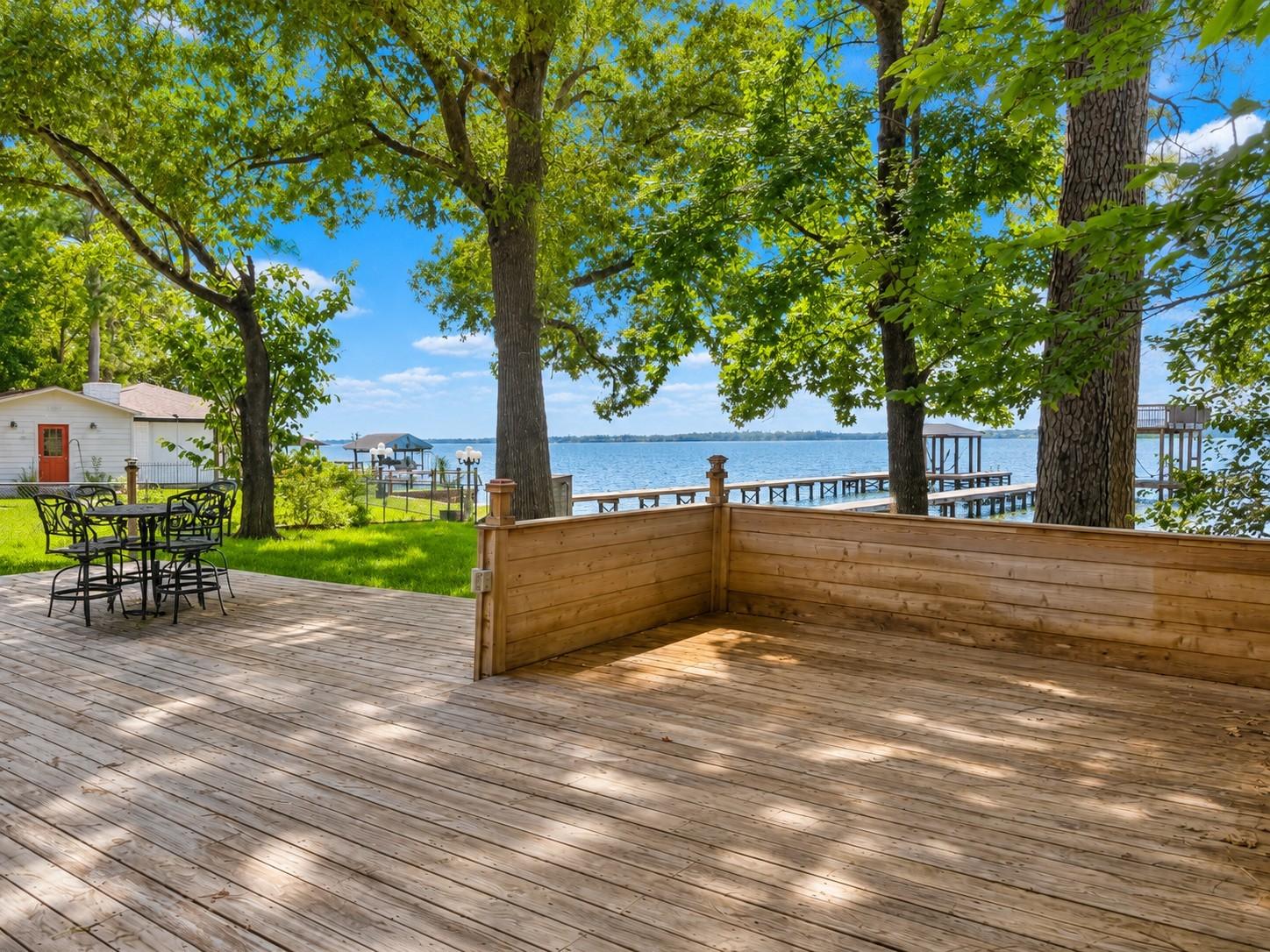 Image 4: The tiered deck extends the width of the house and