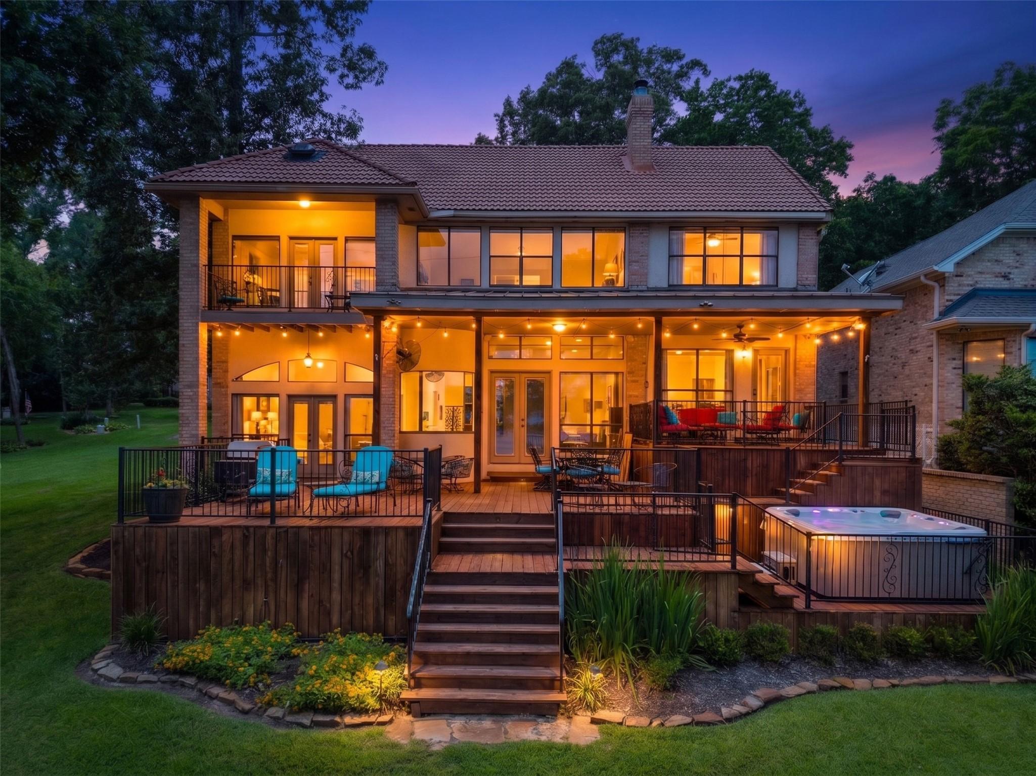 Image 2: Rear elevation of home - notice the expansive, par