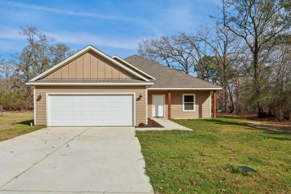 Image 3: Spacious two-car garage offering ample storage and
