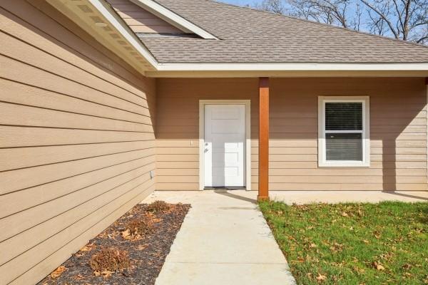 Image 4: Welcoming entryway with a modern flair and pristin