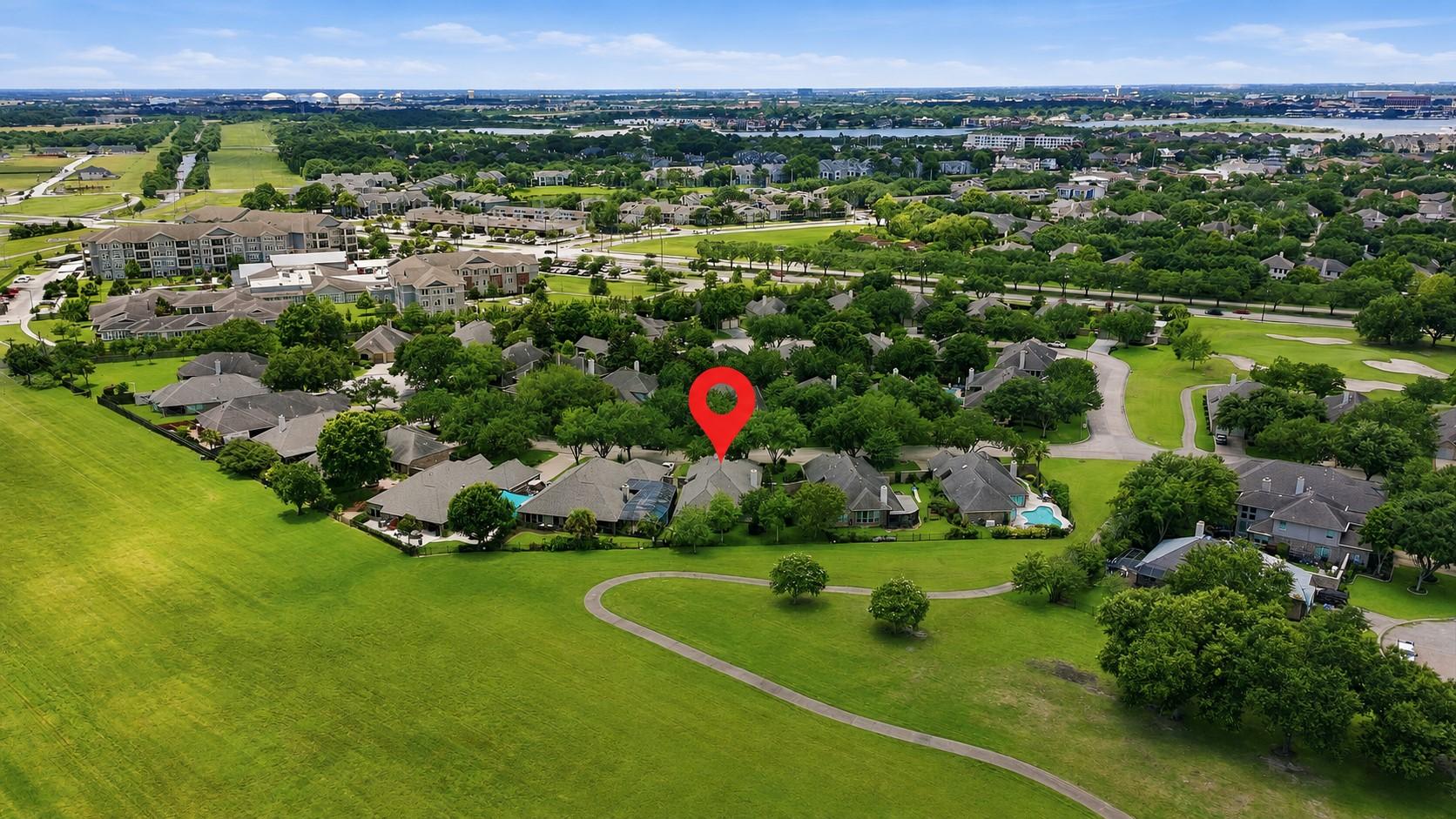 Image 2: This aerial photo showcases a picturesque suburban