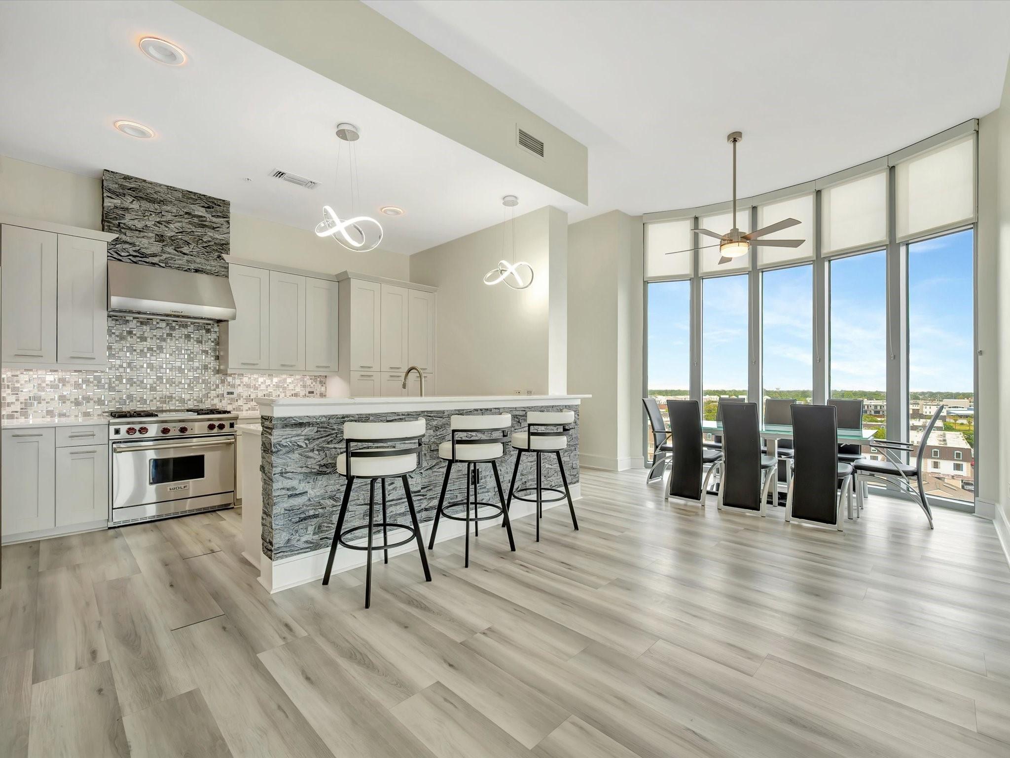 Image 2: Custom open concept kitchen that opens up to your