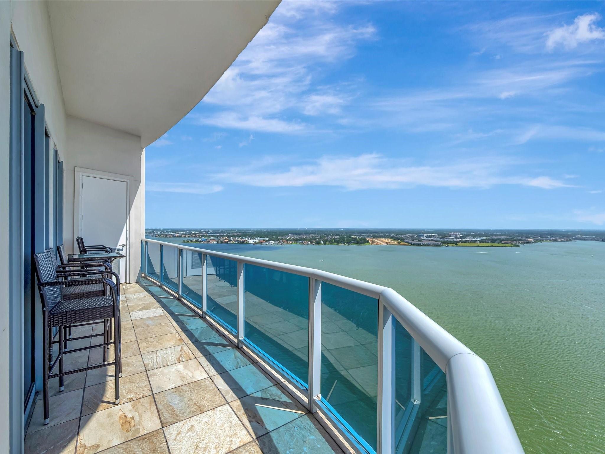 Image 2: This extended balcony offers ample space for enter