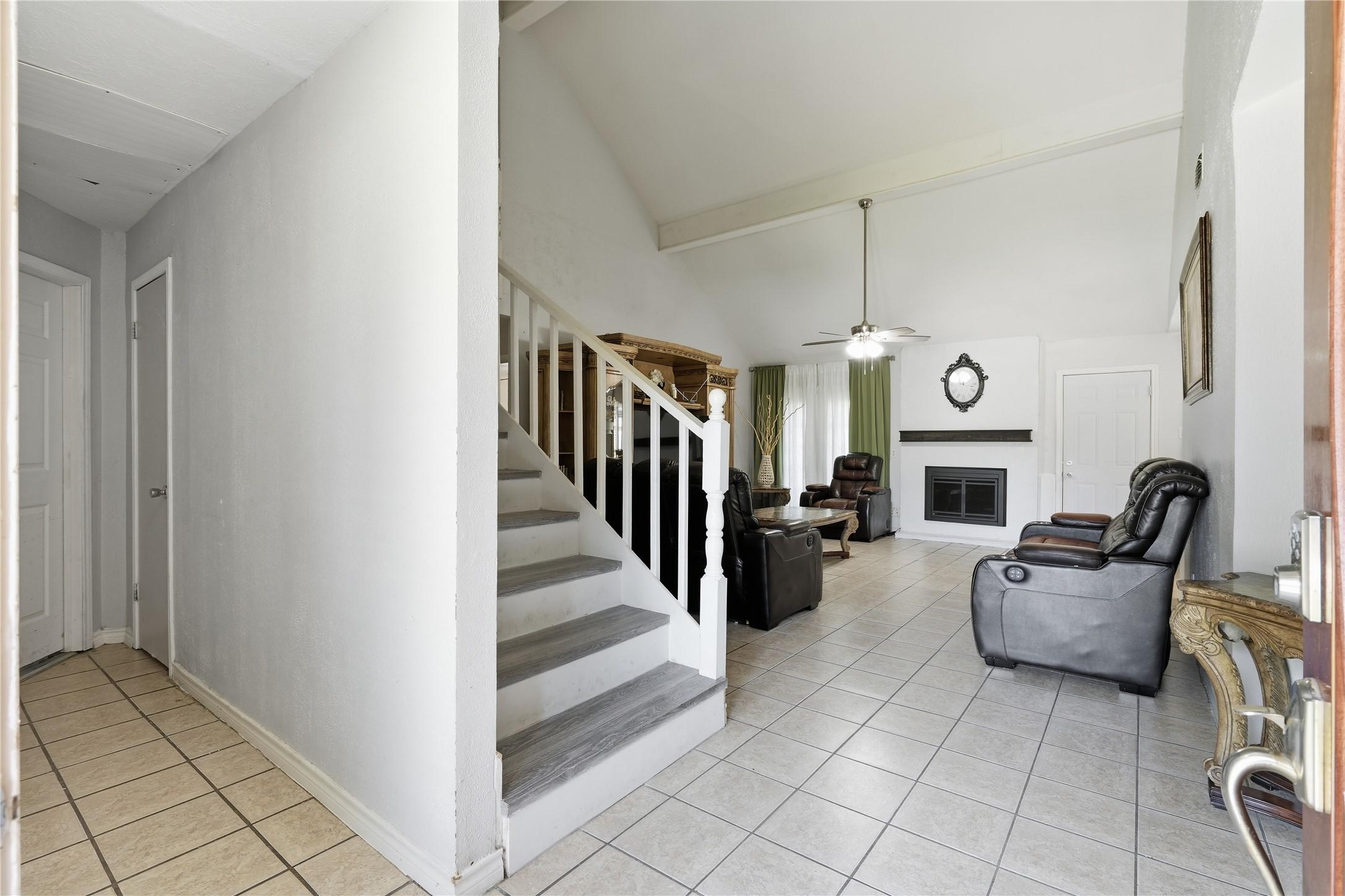 Image 4: Entrance of the home facing the living room. Half