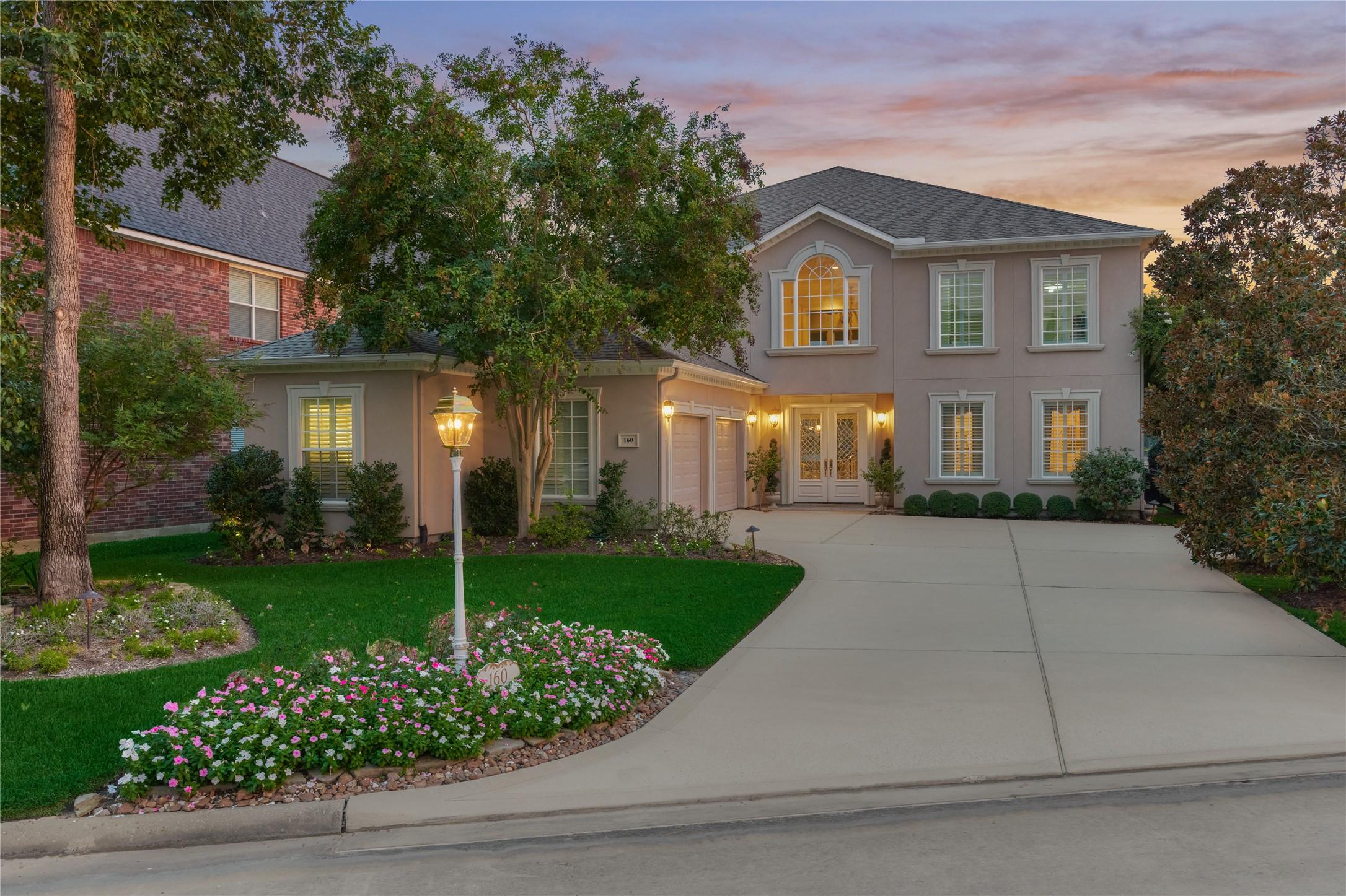 Image 1: 160 Westlake Pt is a gorgeous custom home on the b