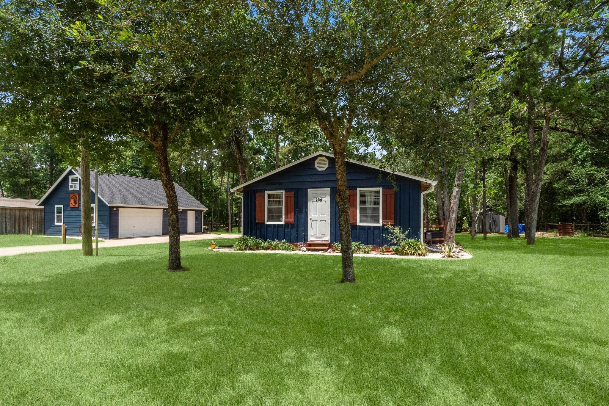 Image 2: A charming, secluded home nestled in a lush, fores