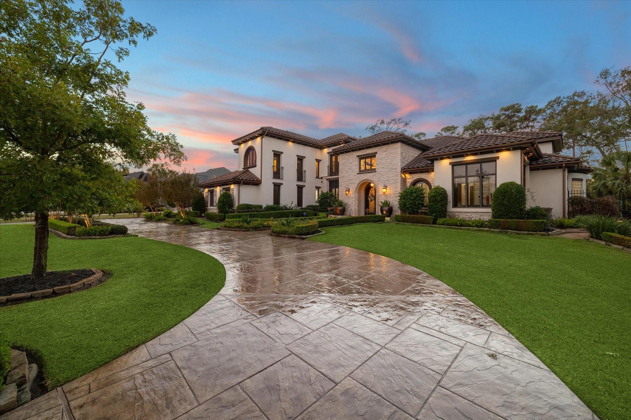Image 4: This is a luxurious two-story estate featuring a M