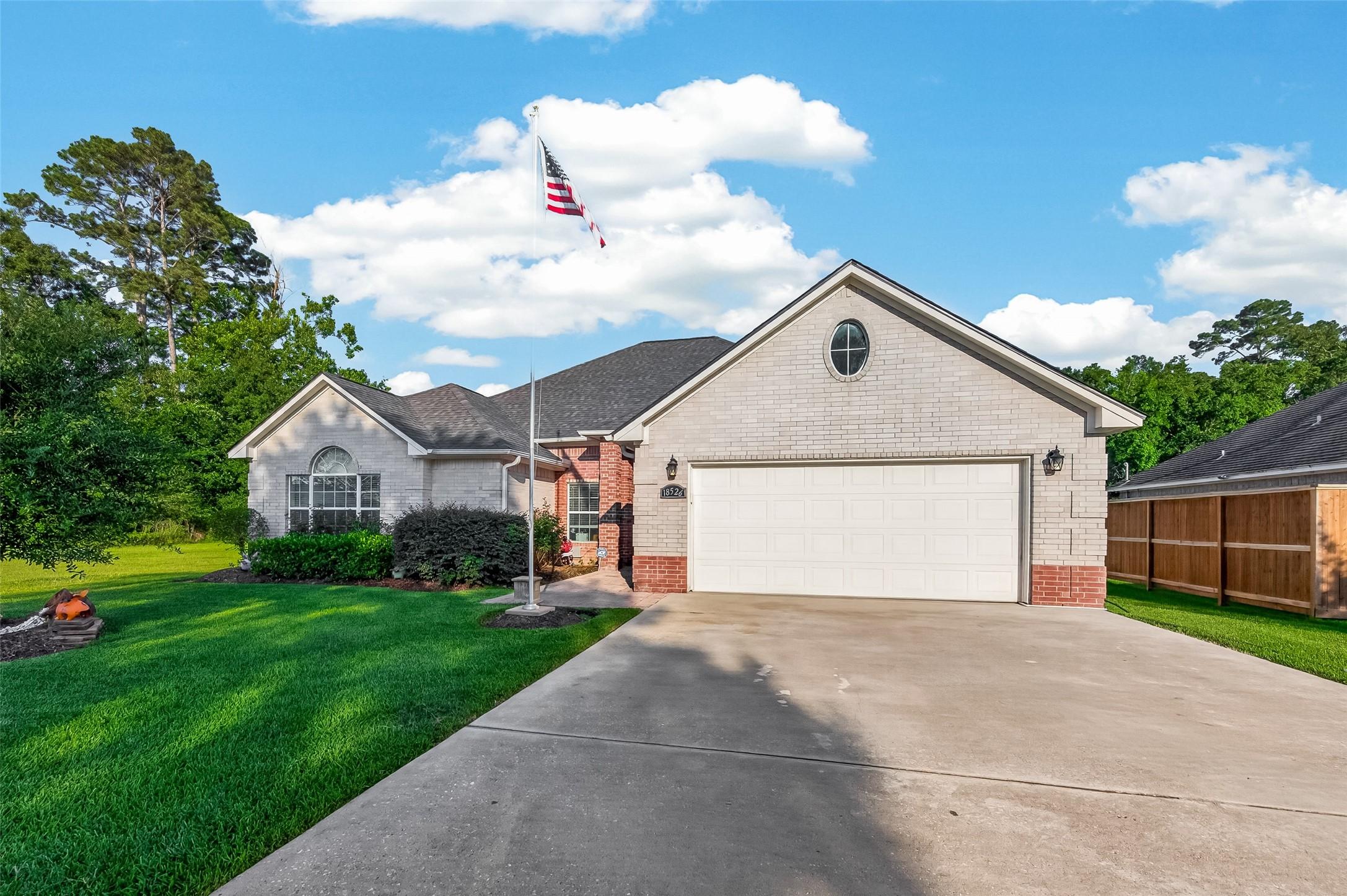 Image 3: This charming single-story home features a well-ma