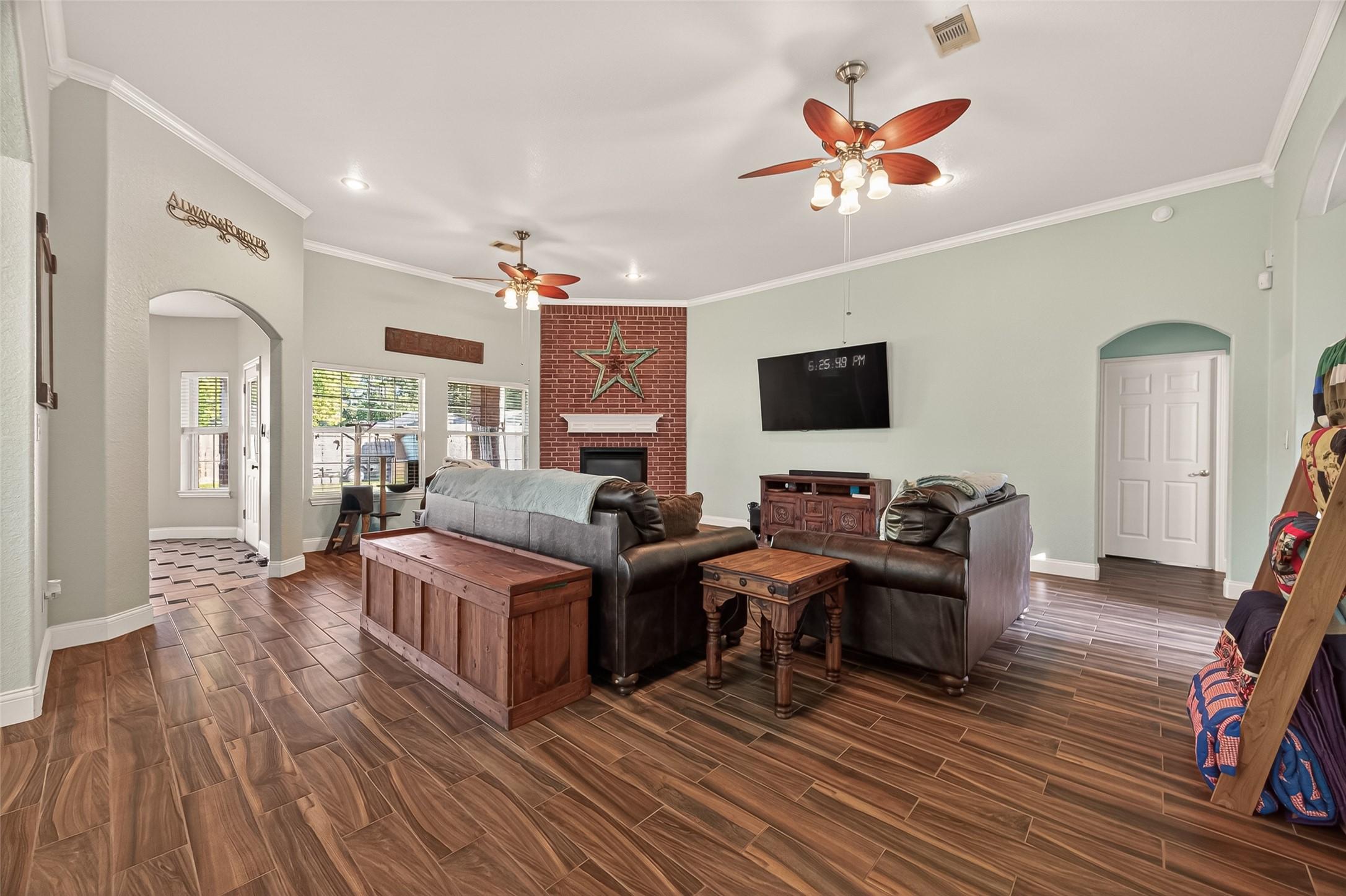 Image 4: Step into a welcoming living room featuring elegan