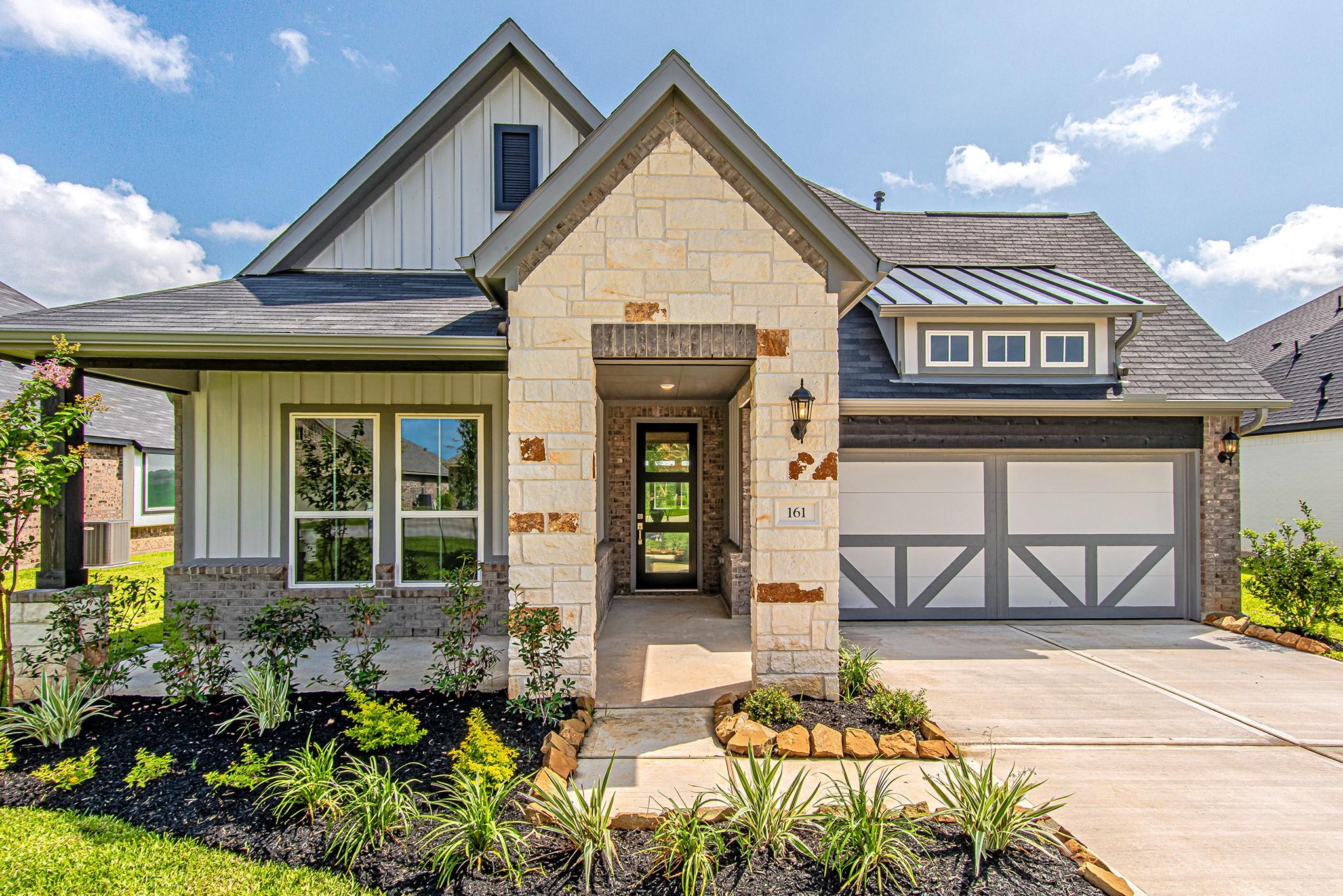 Image 2: Inviting front entrance featuring attractive archi