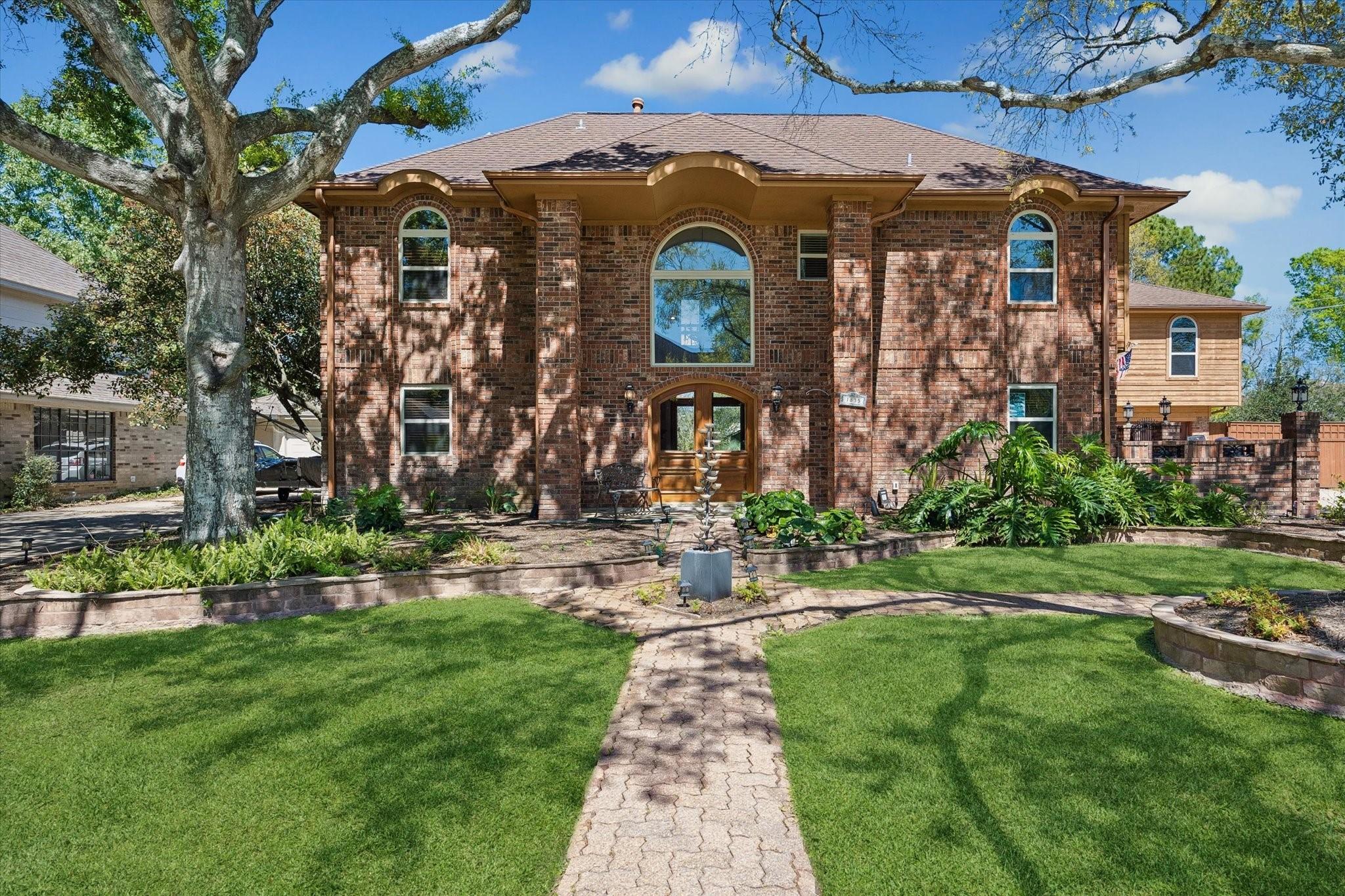 Image 1: Low tax rate, unique Custom home nestled in the ba