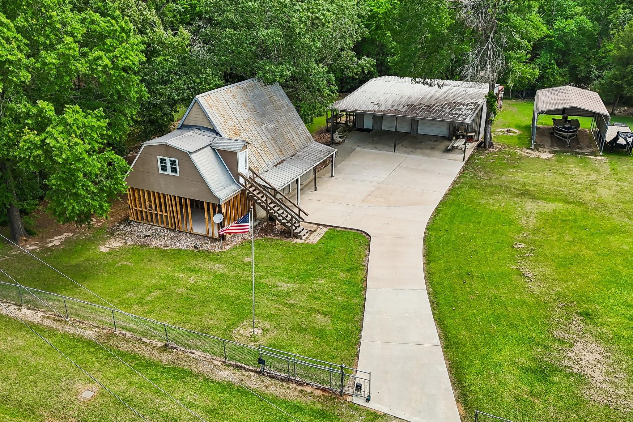Image 2: This bird&rsquo;s-eye perspective showcases the gated en