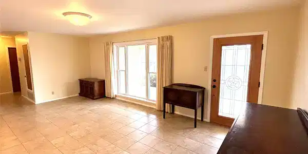 Image 3: Front Entry and Living Room.
