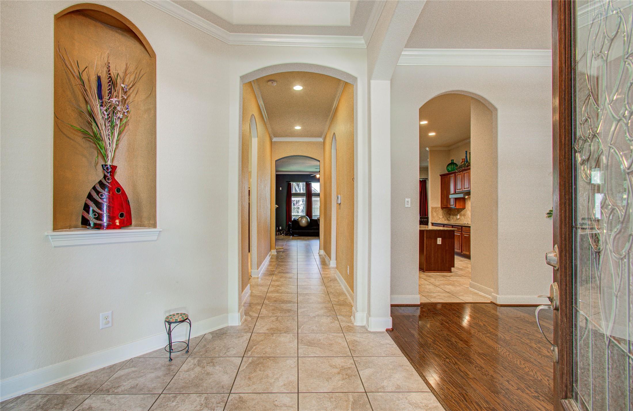 Image 2: Gorgeous entry foyer is welcomed with elevated cei