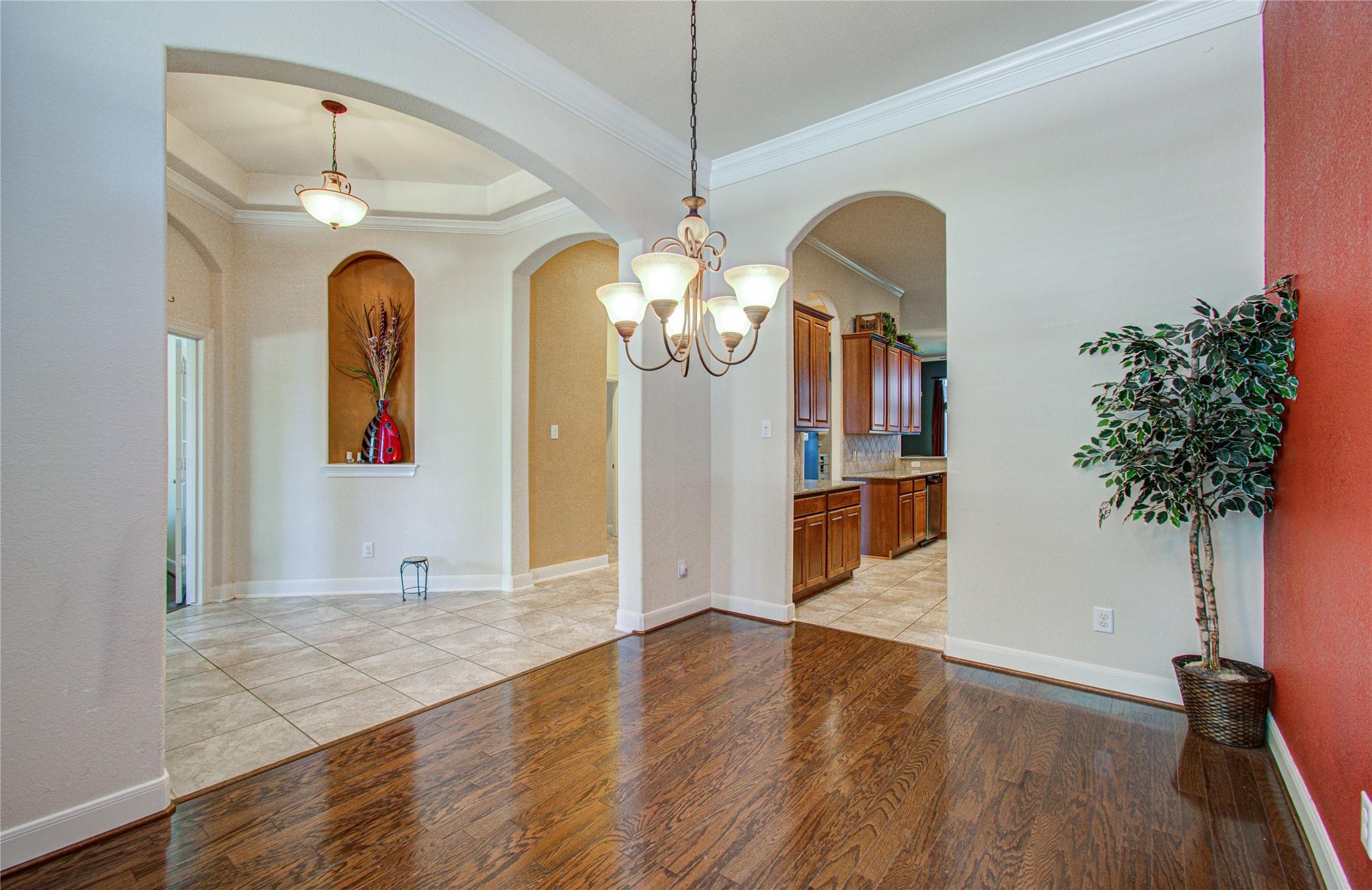 Image 3: Formal dining can double as a flex-use area compli